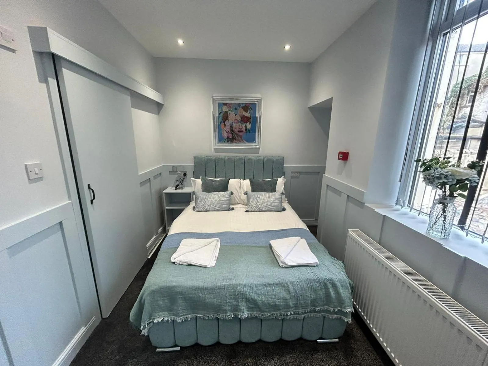 Bedroom, Bed in Sugar Hill Suite by Sasco Apartments