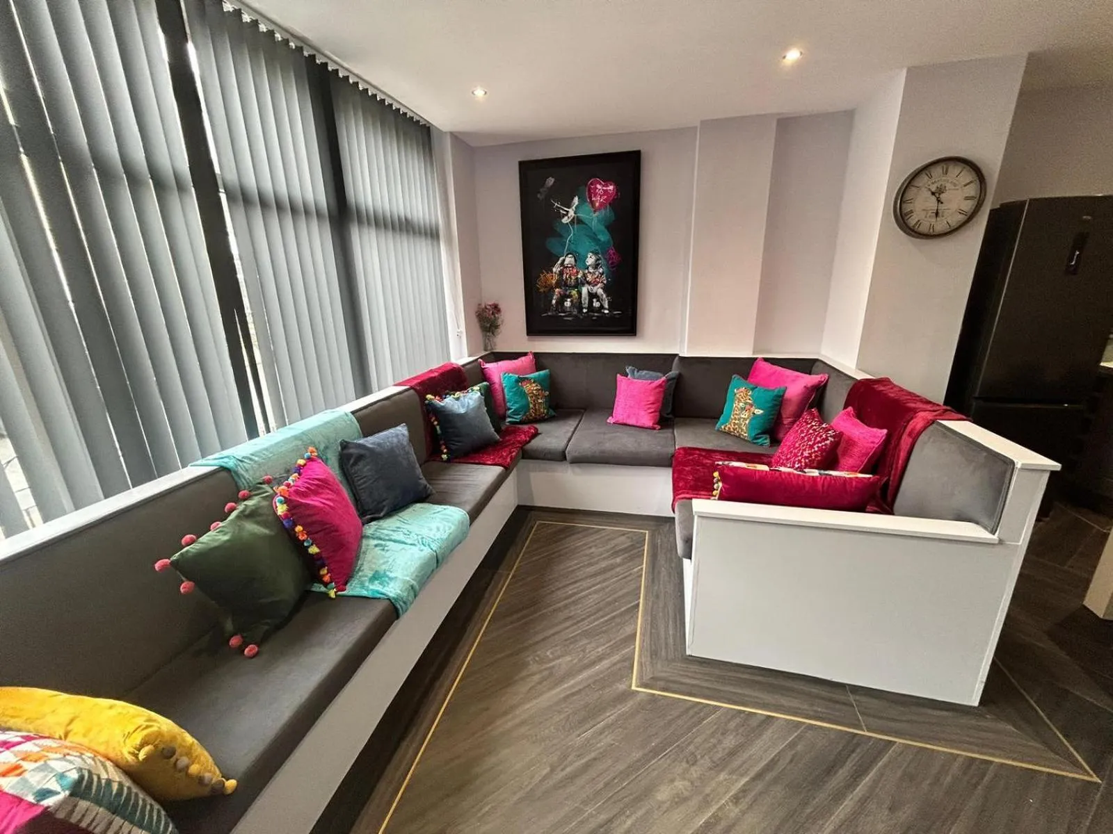 Living room in Sugar Hill Suite by Sasco Apartments