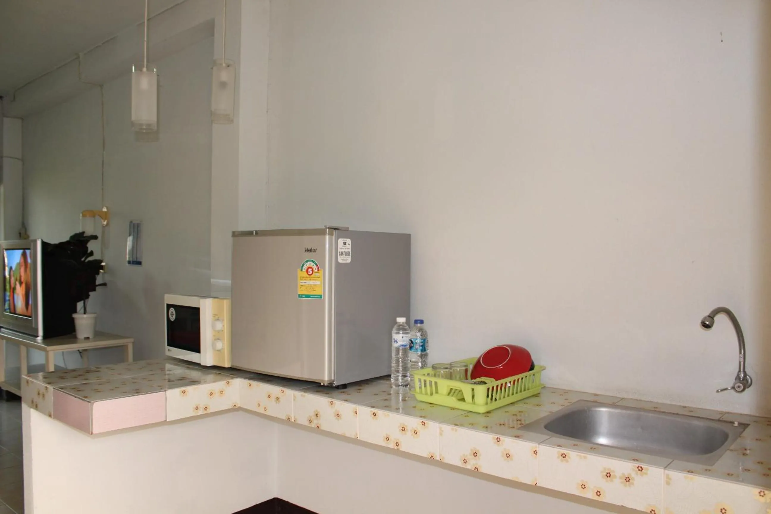 Bedroom in OYO 75420 Howto Hotel