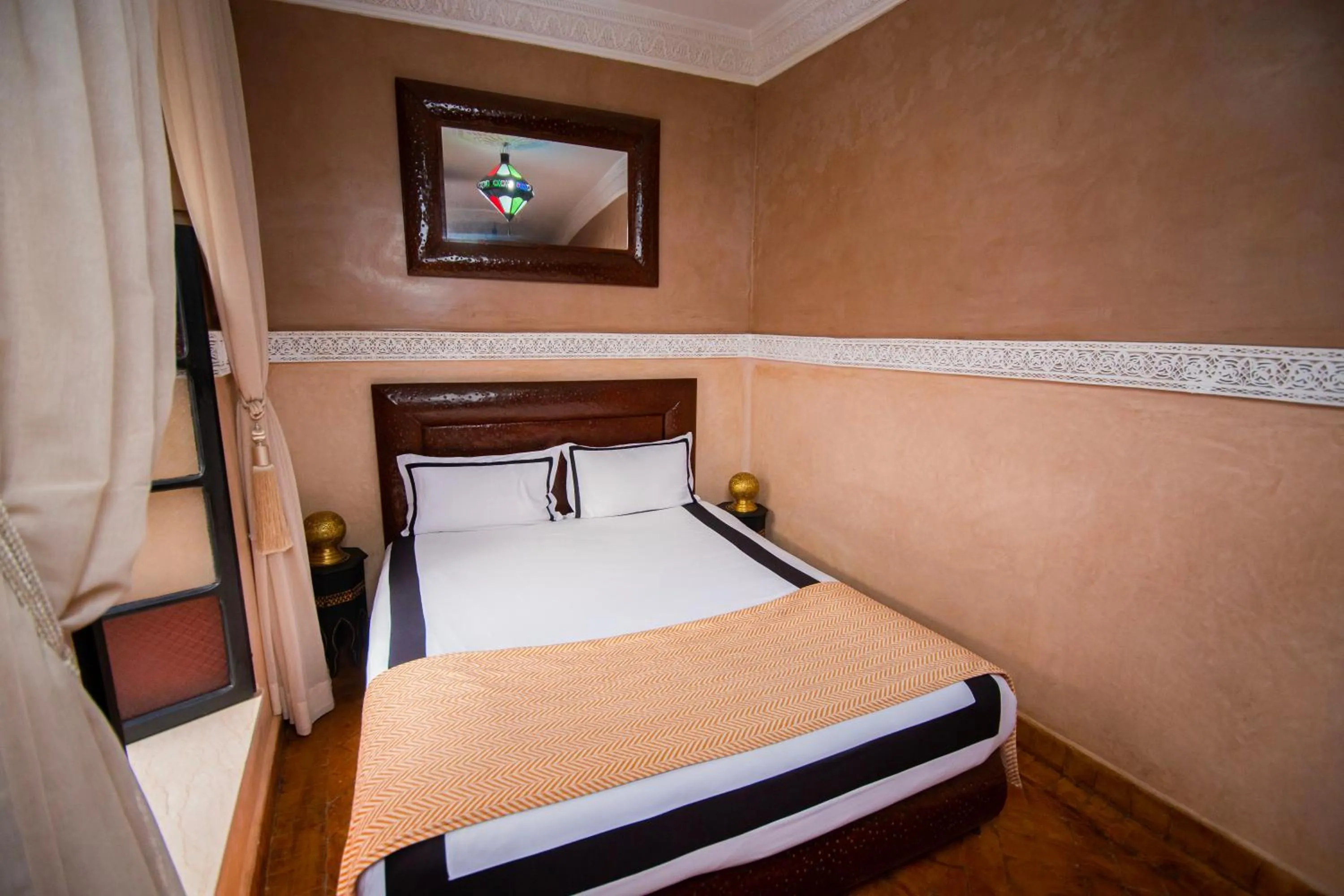 Photo of the whole room, Bed in Riad Ta'achchaqa