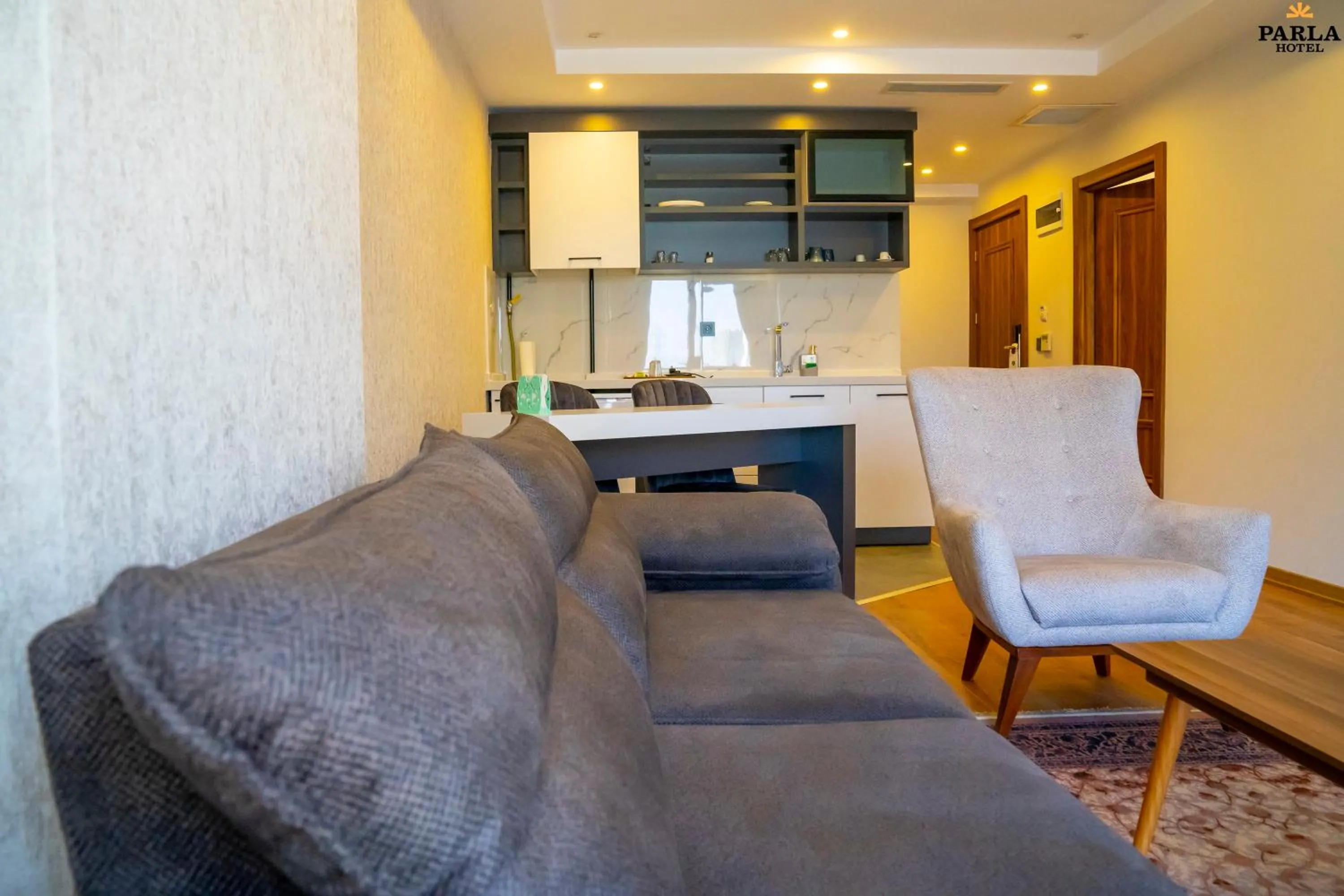 Kitchen or kitchenette in Parla Suite Hotel