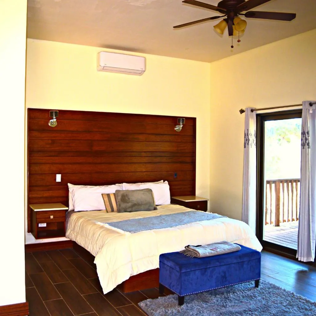 Bed in Omni Sancti Hotel Boutique & Polo Club