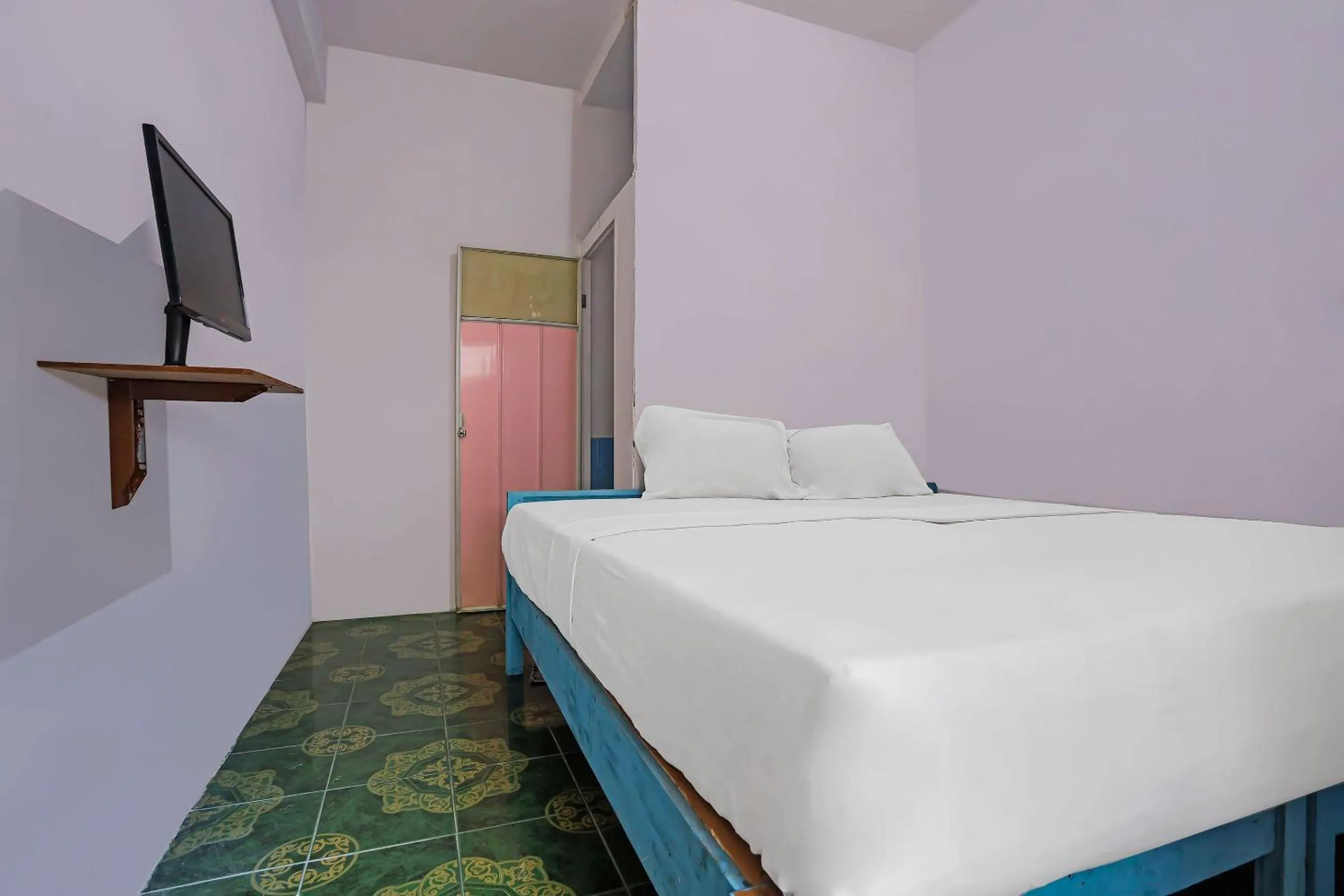 Bedroom, Bed in Hotel O City Kost Syariah