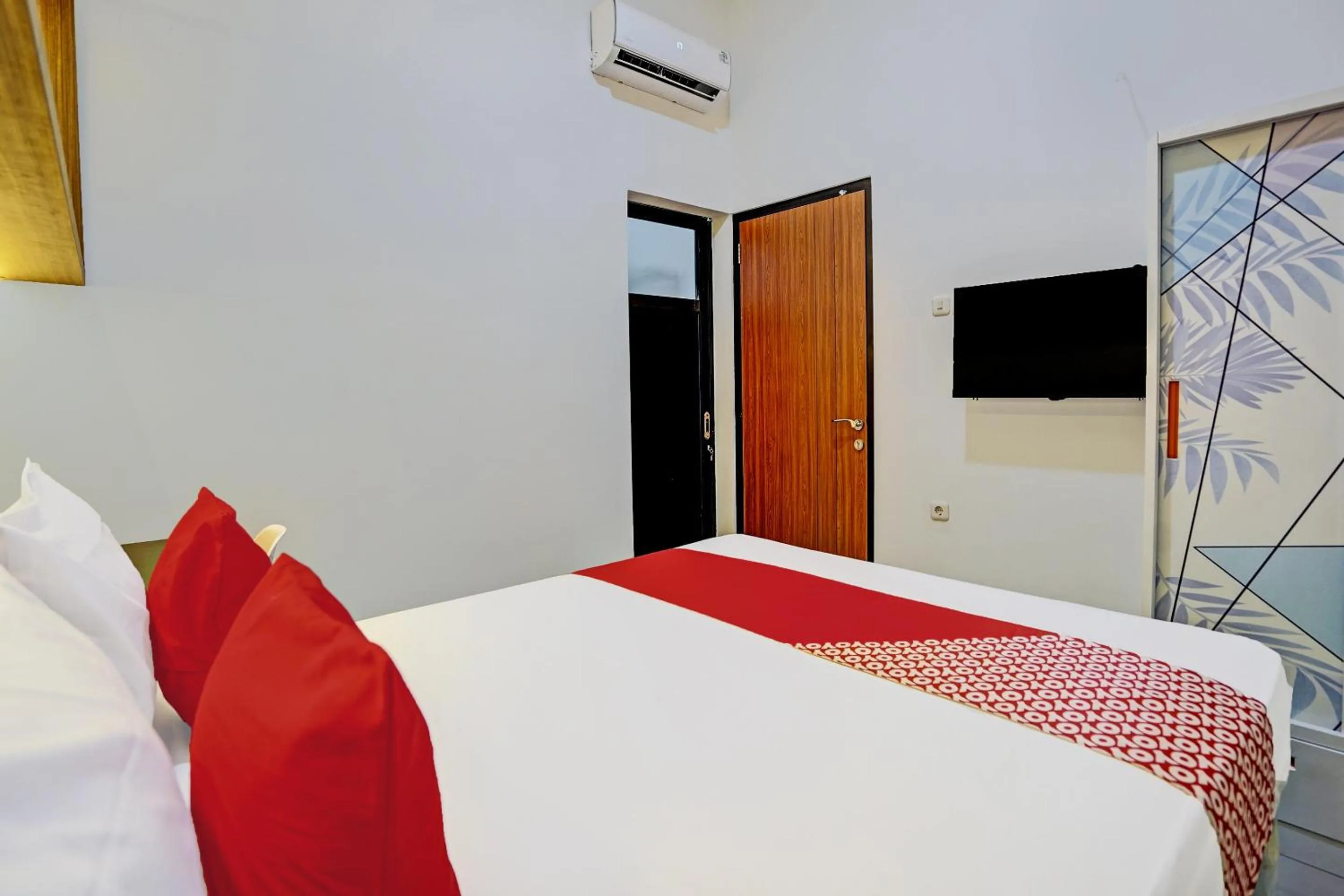 Bedroom in Hotel O Sunlo Cozy Home Family Homestay Syariah