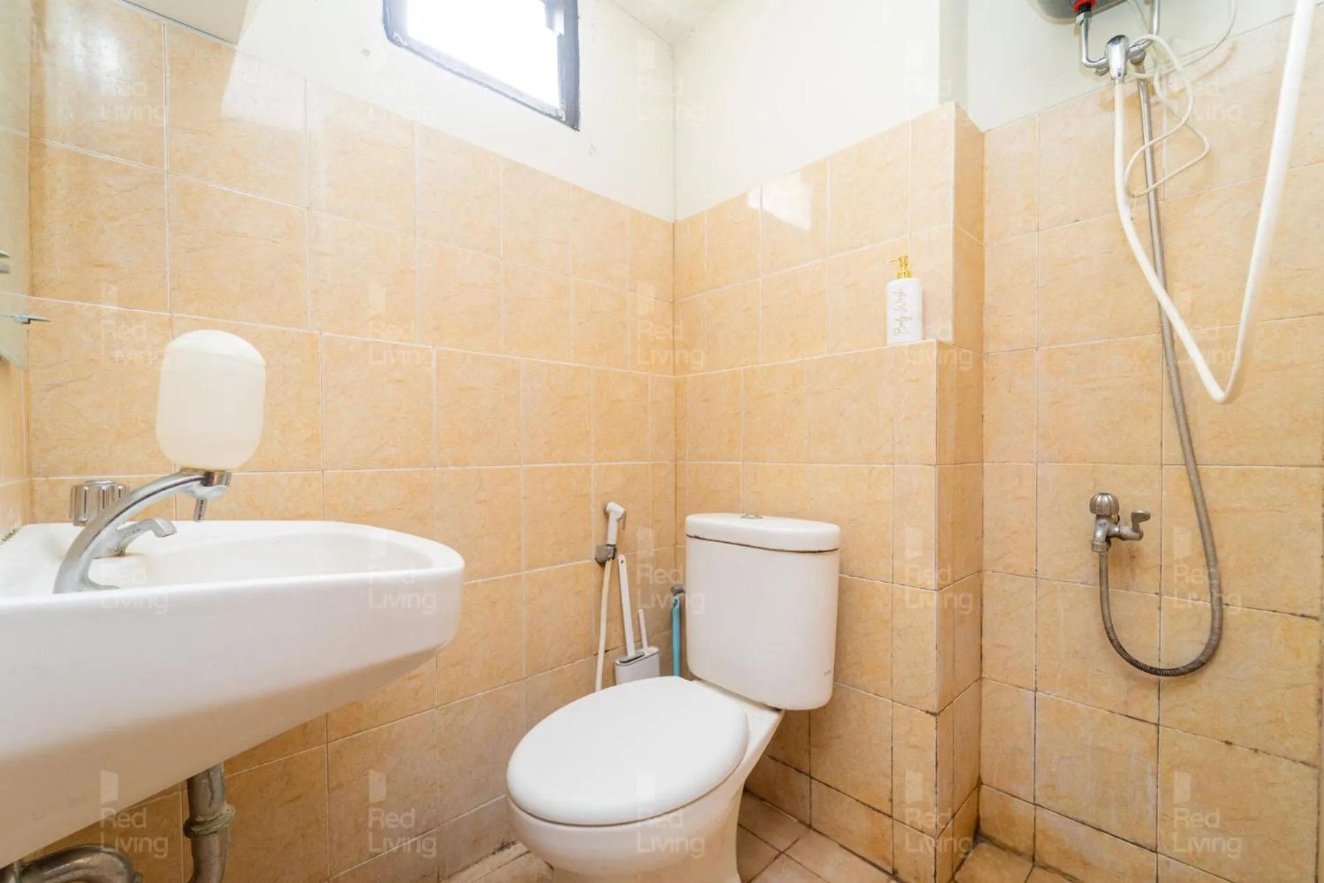 Bathroom in RedLiving Apartemen Kebagusan City - Nuna Rooms