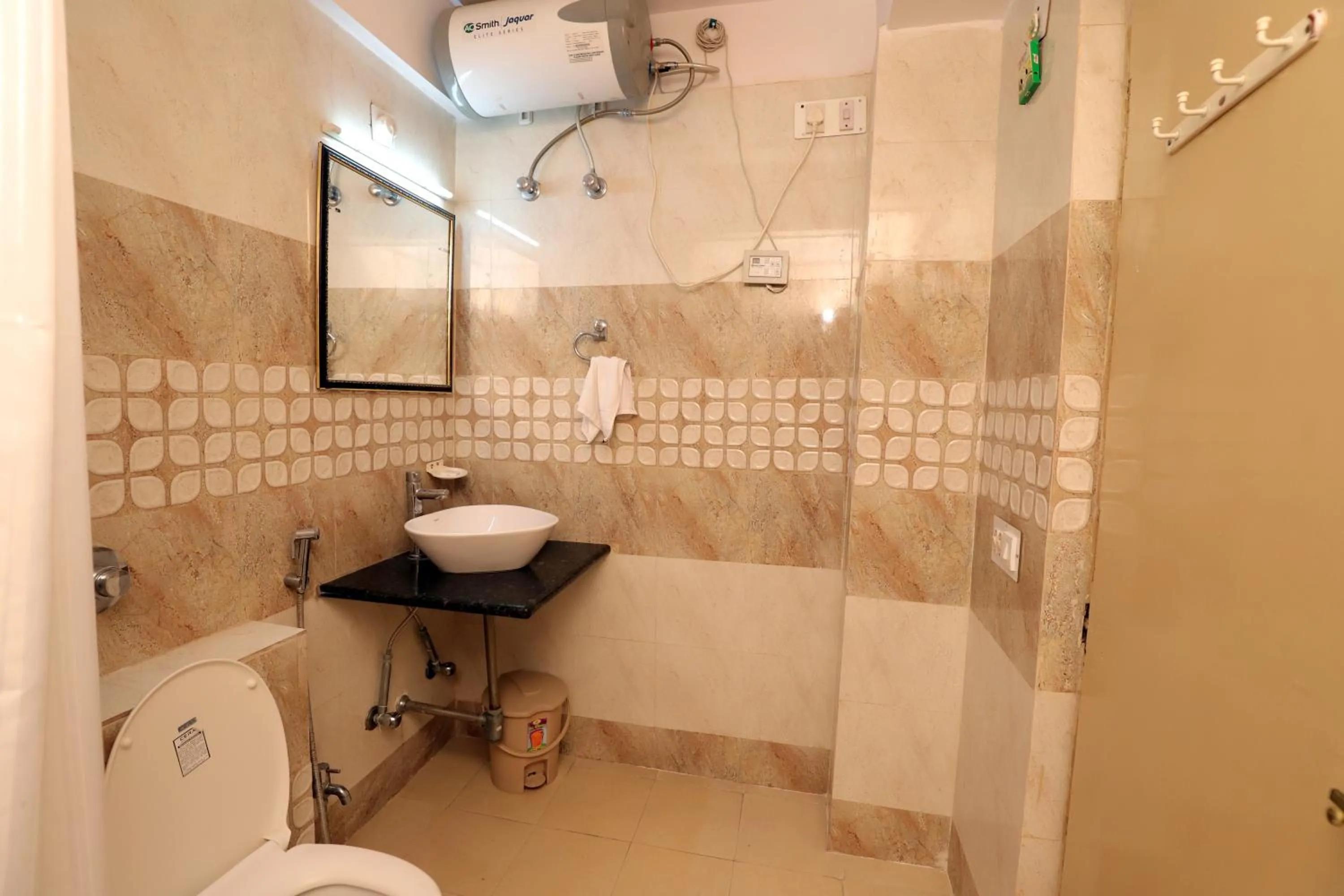 Toilet in Hotel Green View International