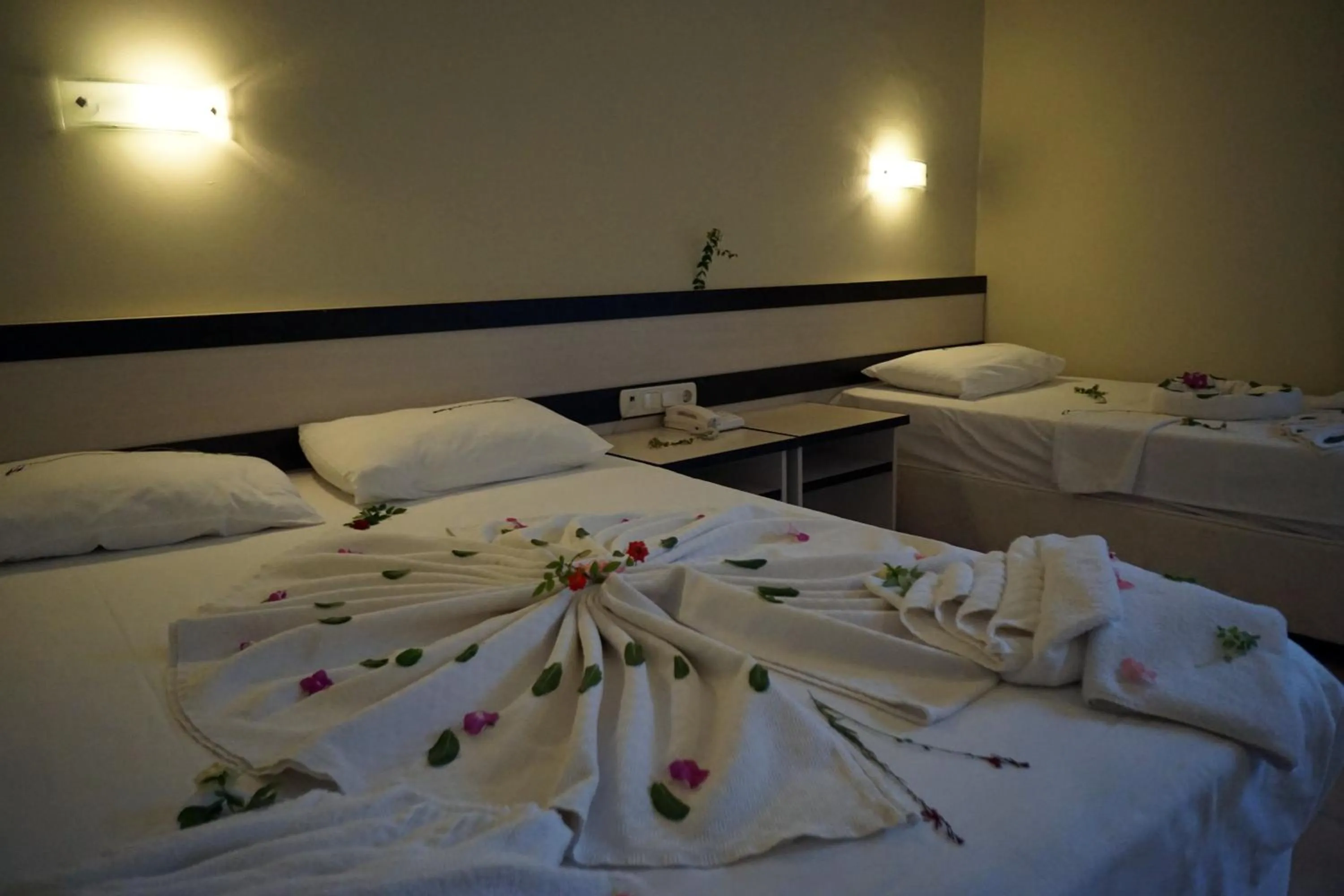 Bed in Aybel İnn Hotel