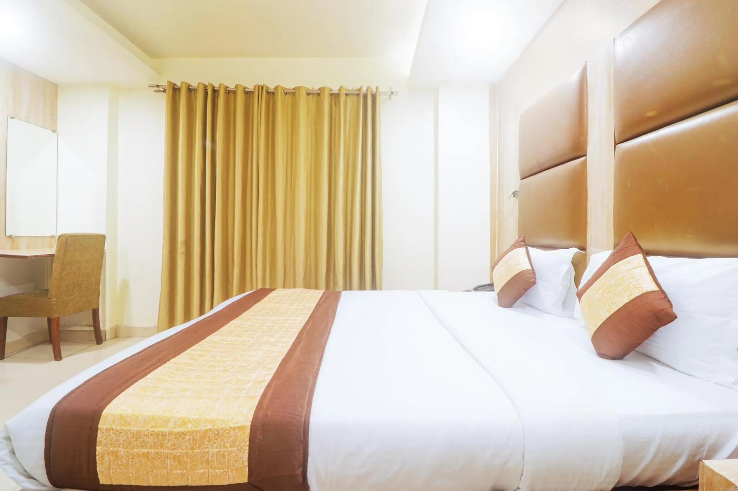 Bed in Hotel Sizzling Starr