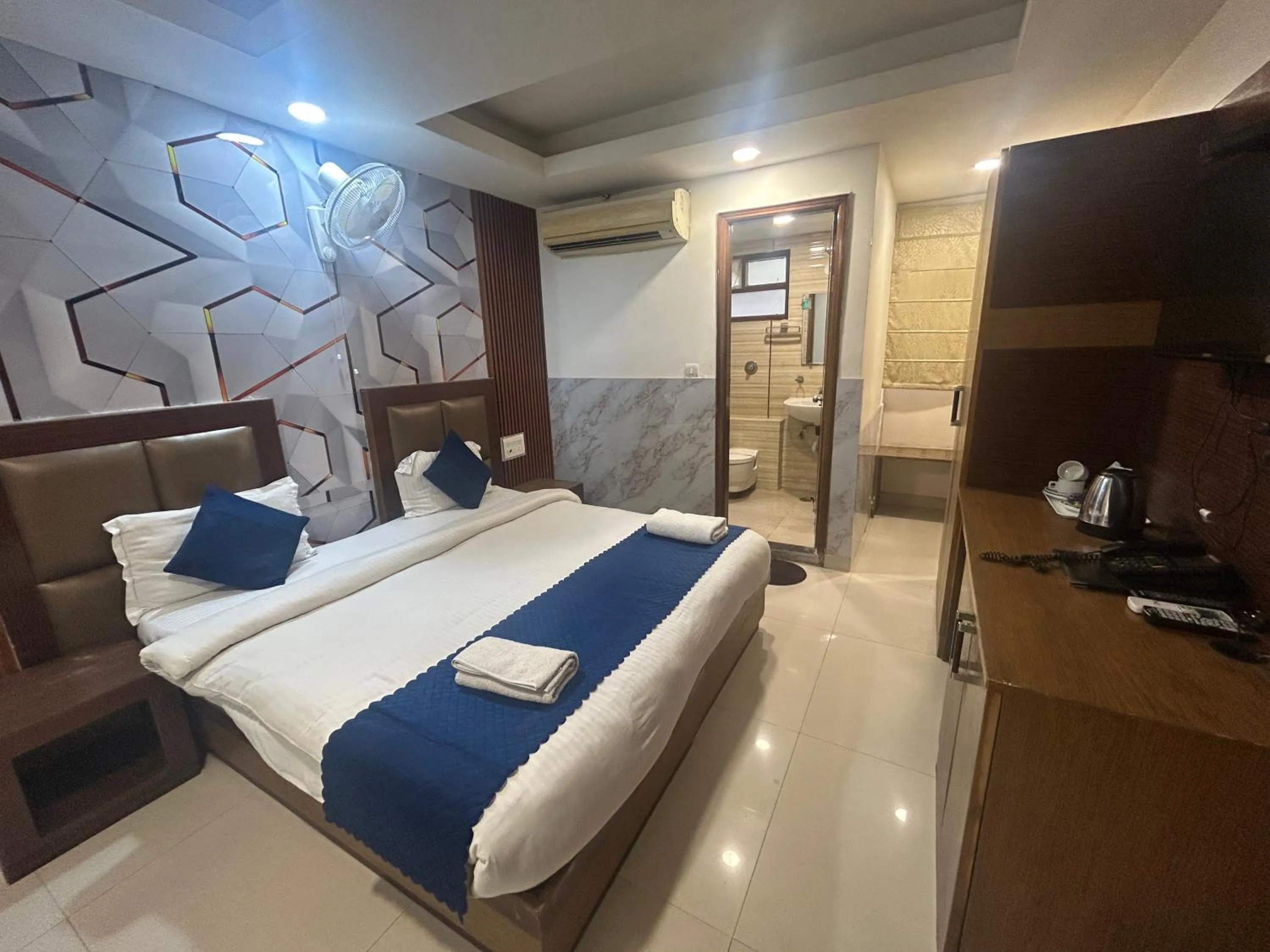 Bed in Hotel Sizzling Starr