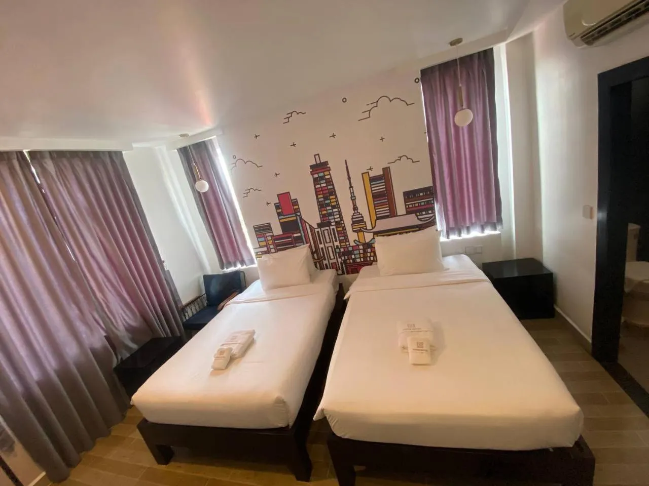 Bed in Times Hotel at Bassac Lane