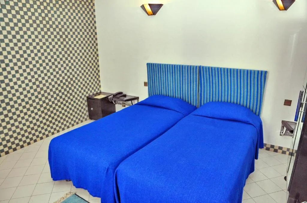 Bed in Appart-Hôtel Tagadirt