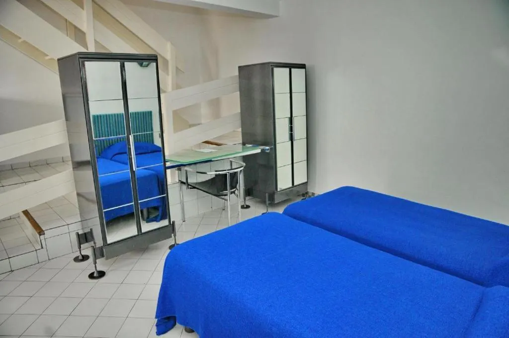 Bed in Appart-Hôtel Tagadirt