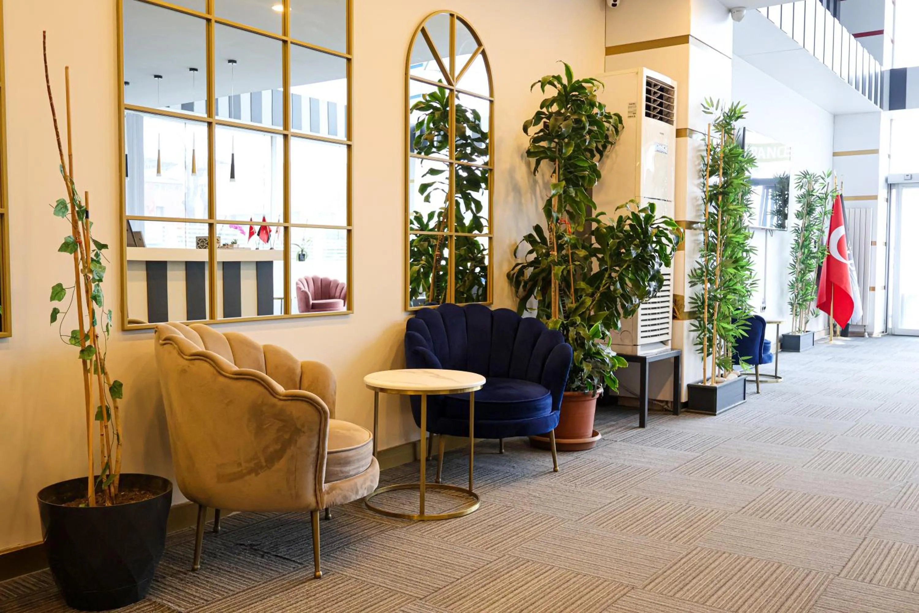 Lobby or reception in HOME PLUS Hotel