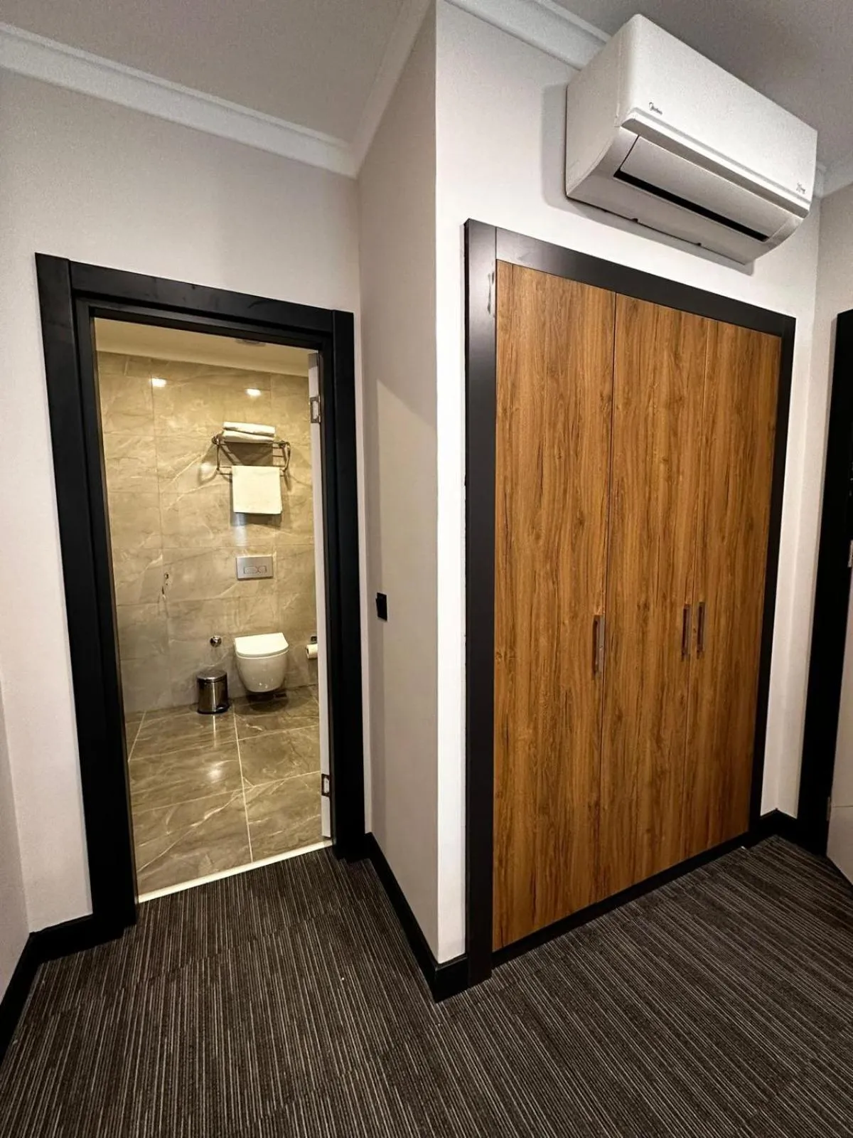 Bathroom in HOME PLUS Hotel