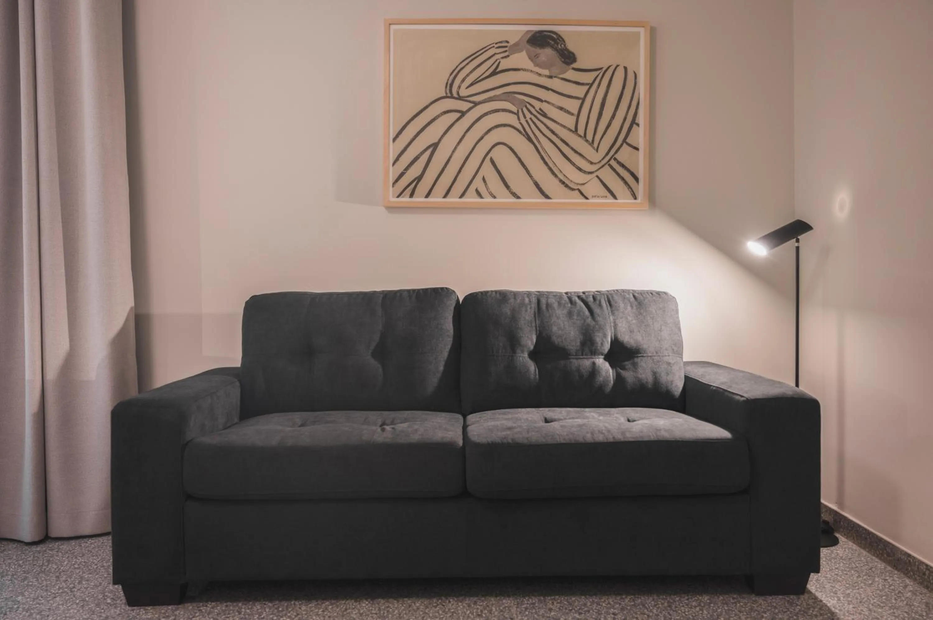 Seating area in Maria Rosa Suites