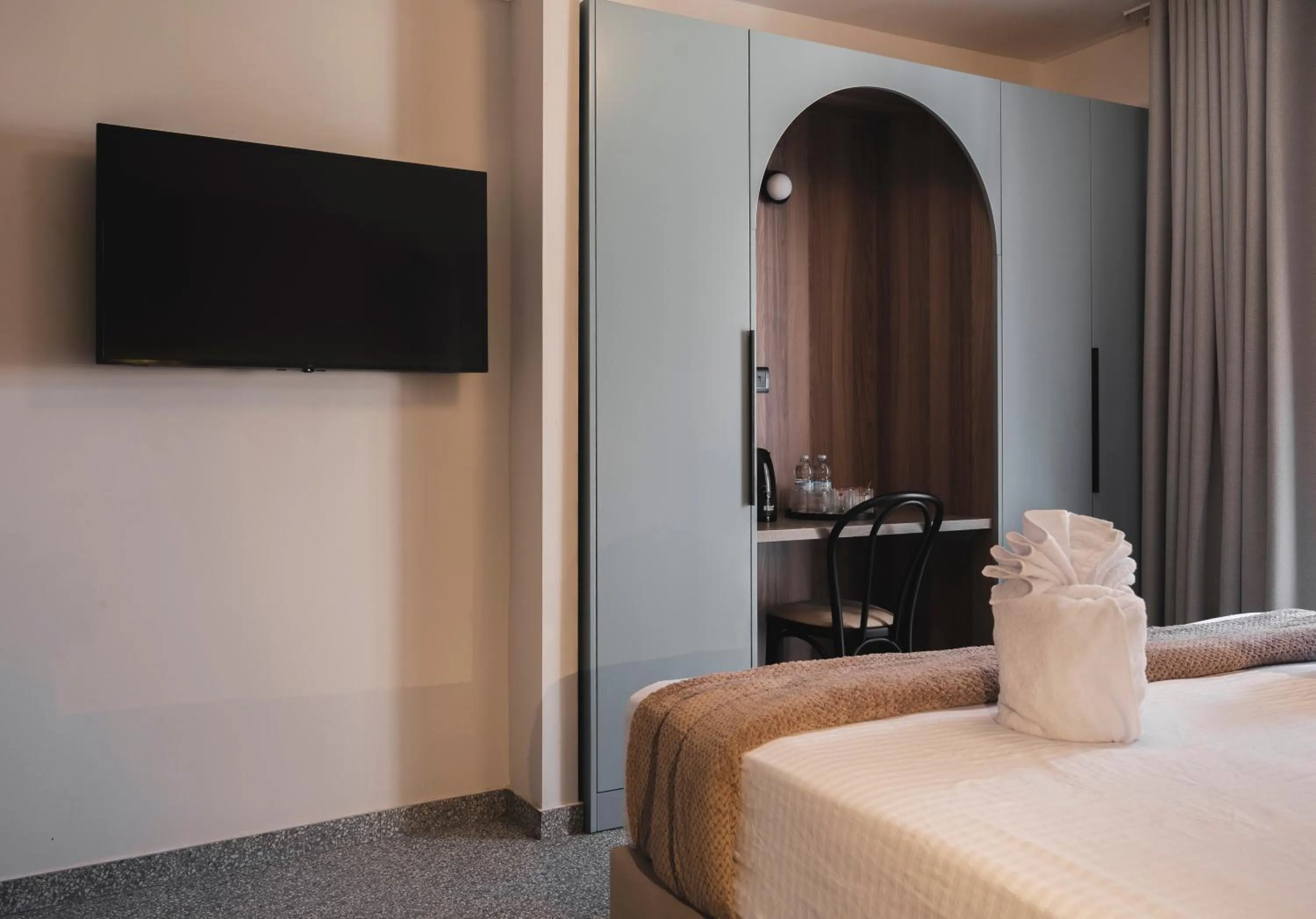 Bed in Maria Rosa Suites