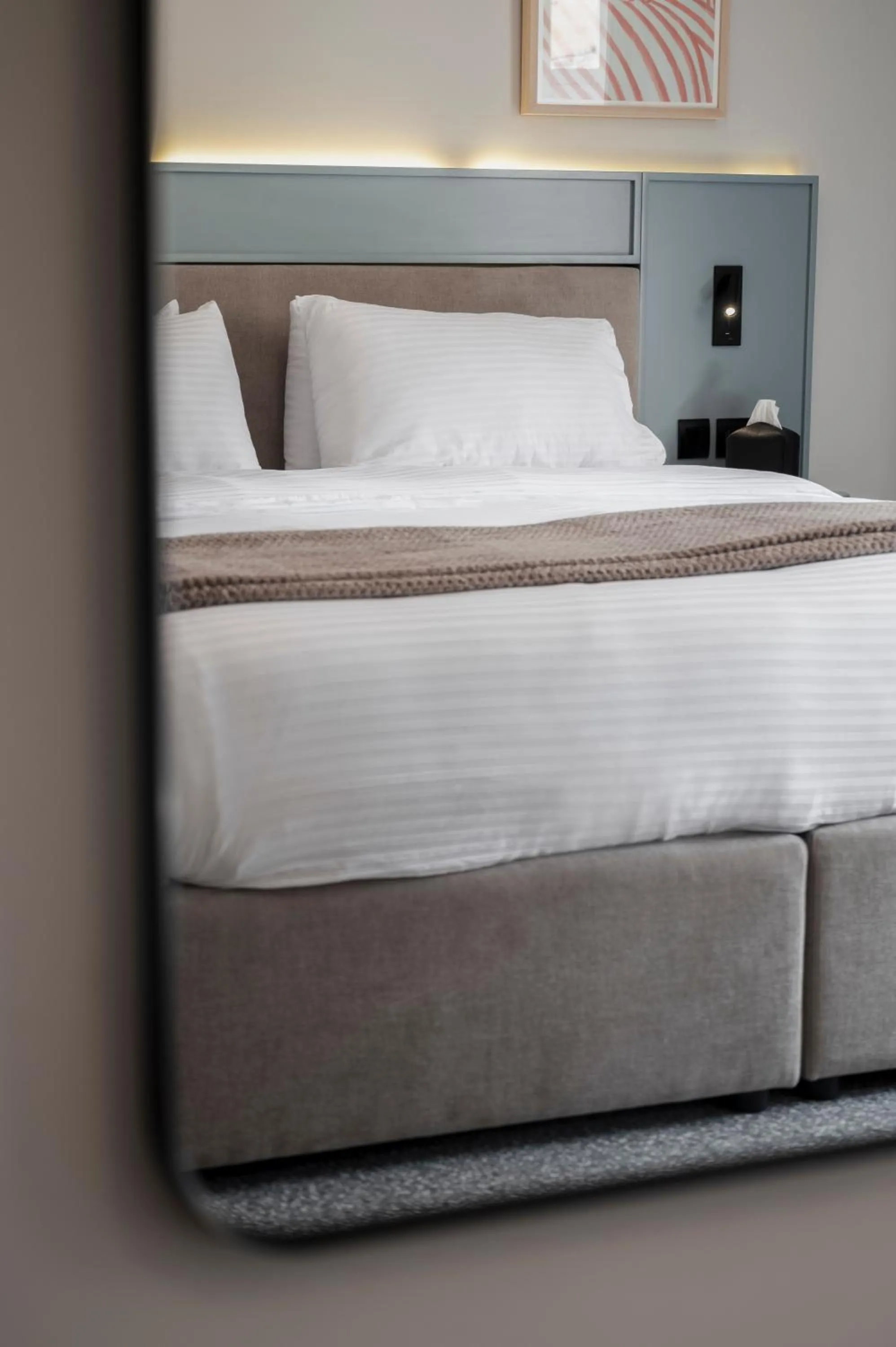 Bed in Maria Rosa Suites