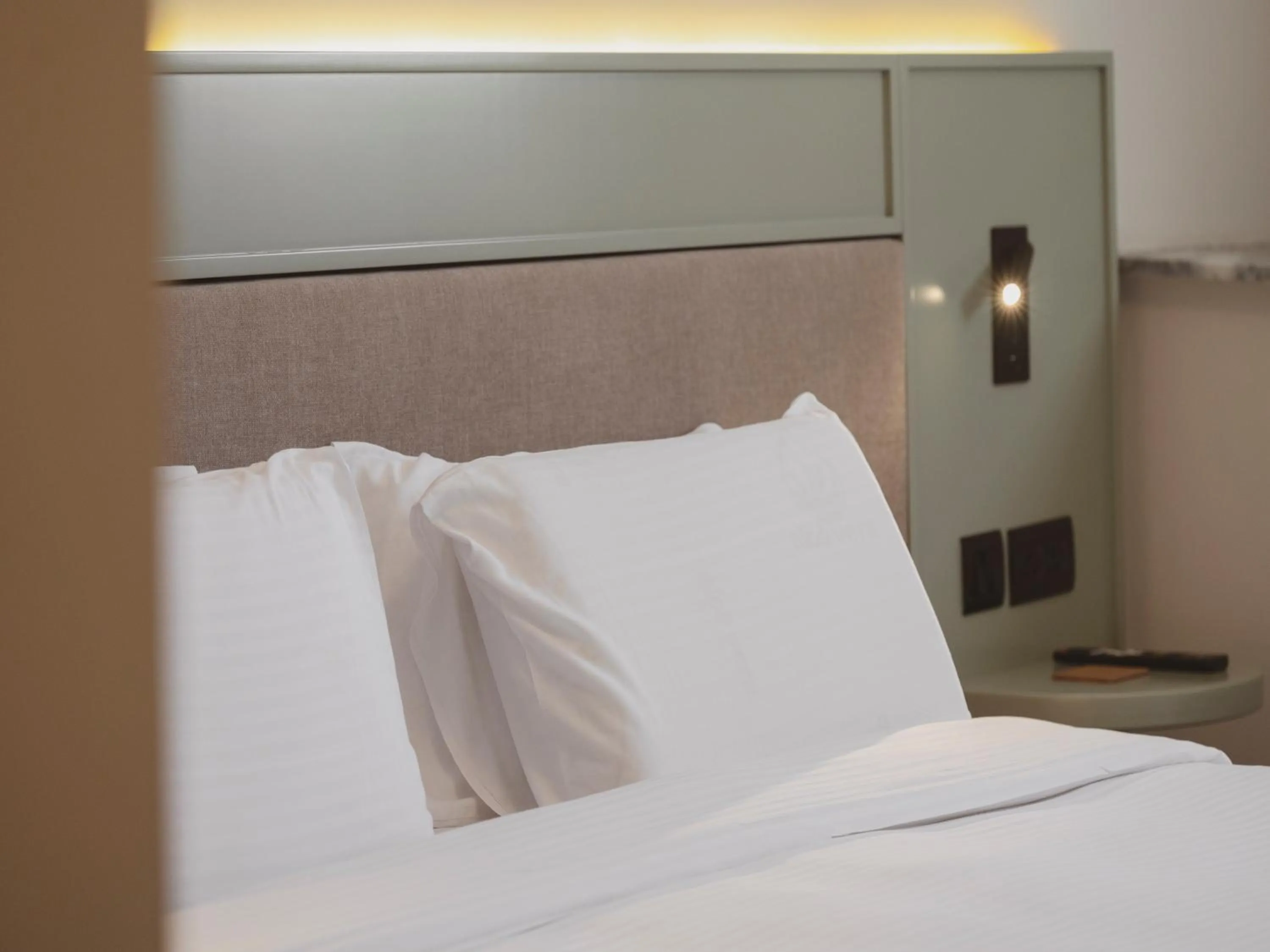 Bed in Maria Rosa Suites