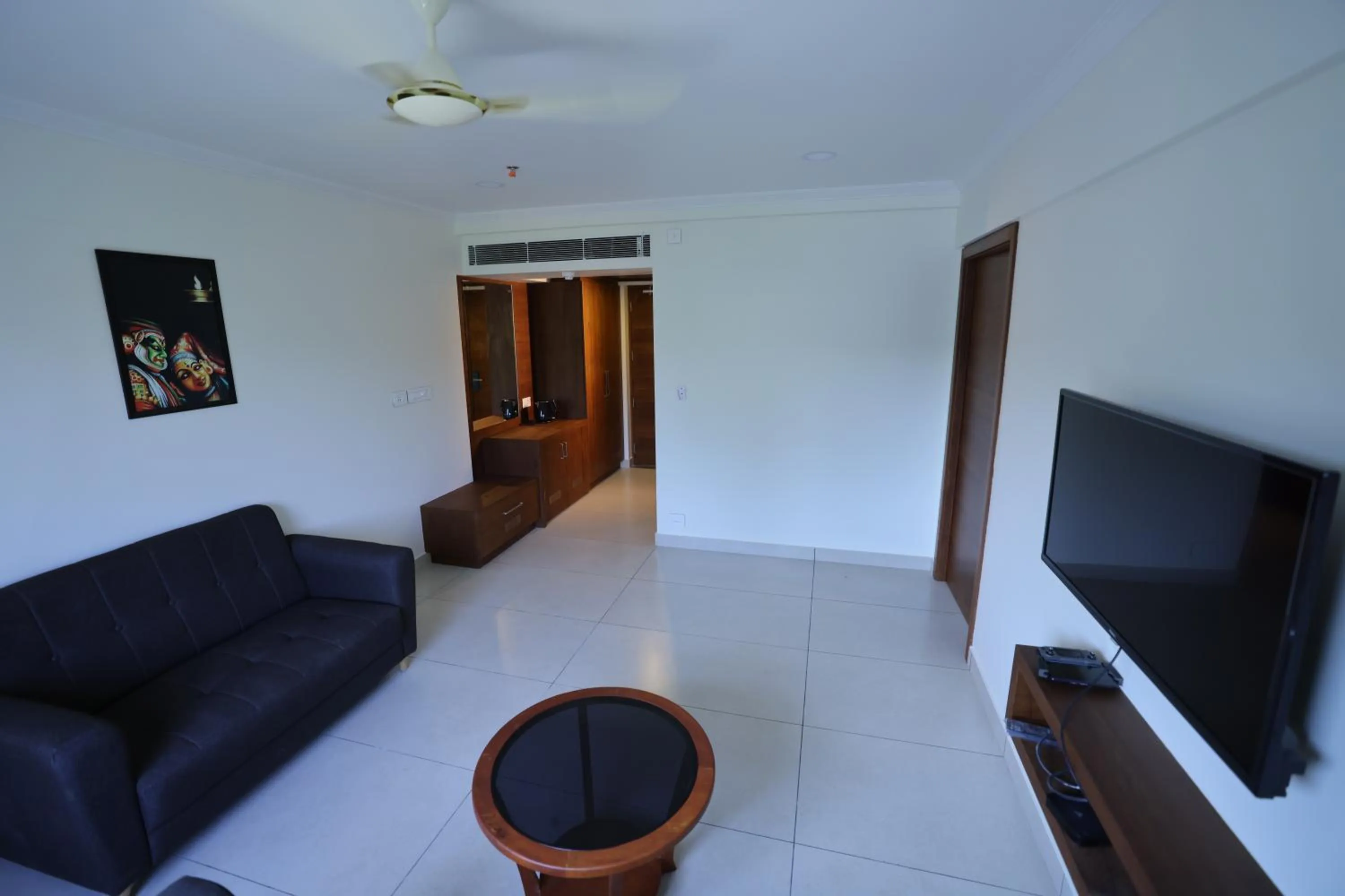 Communal lounge/ TV room in KKM INTERNATIONAL