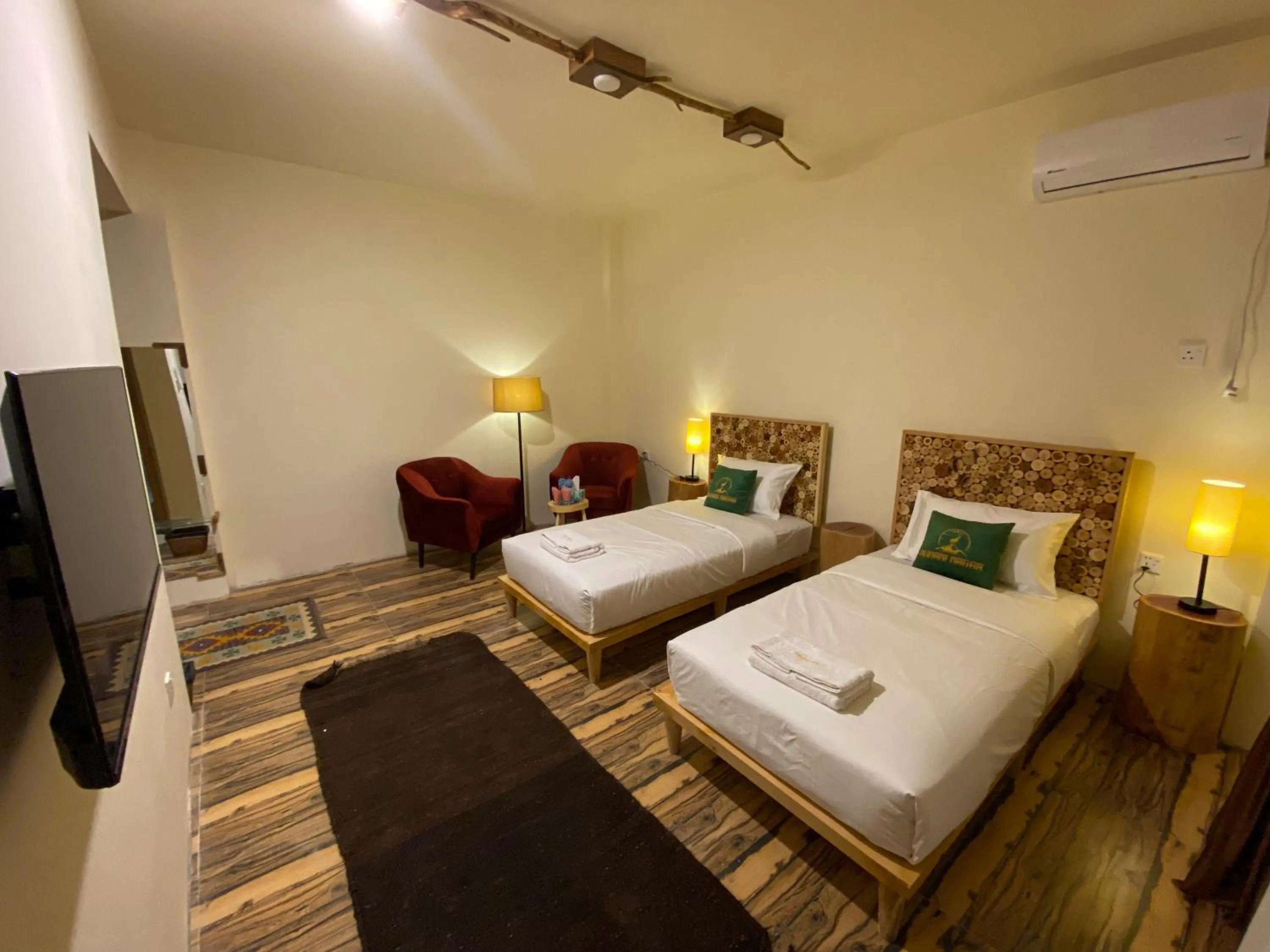 Bed in Dumani Nagar Hotel & Resort