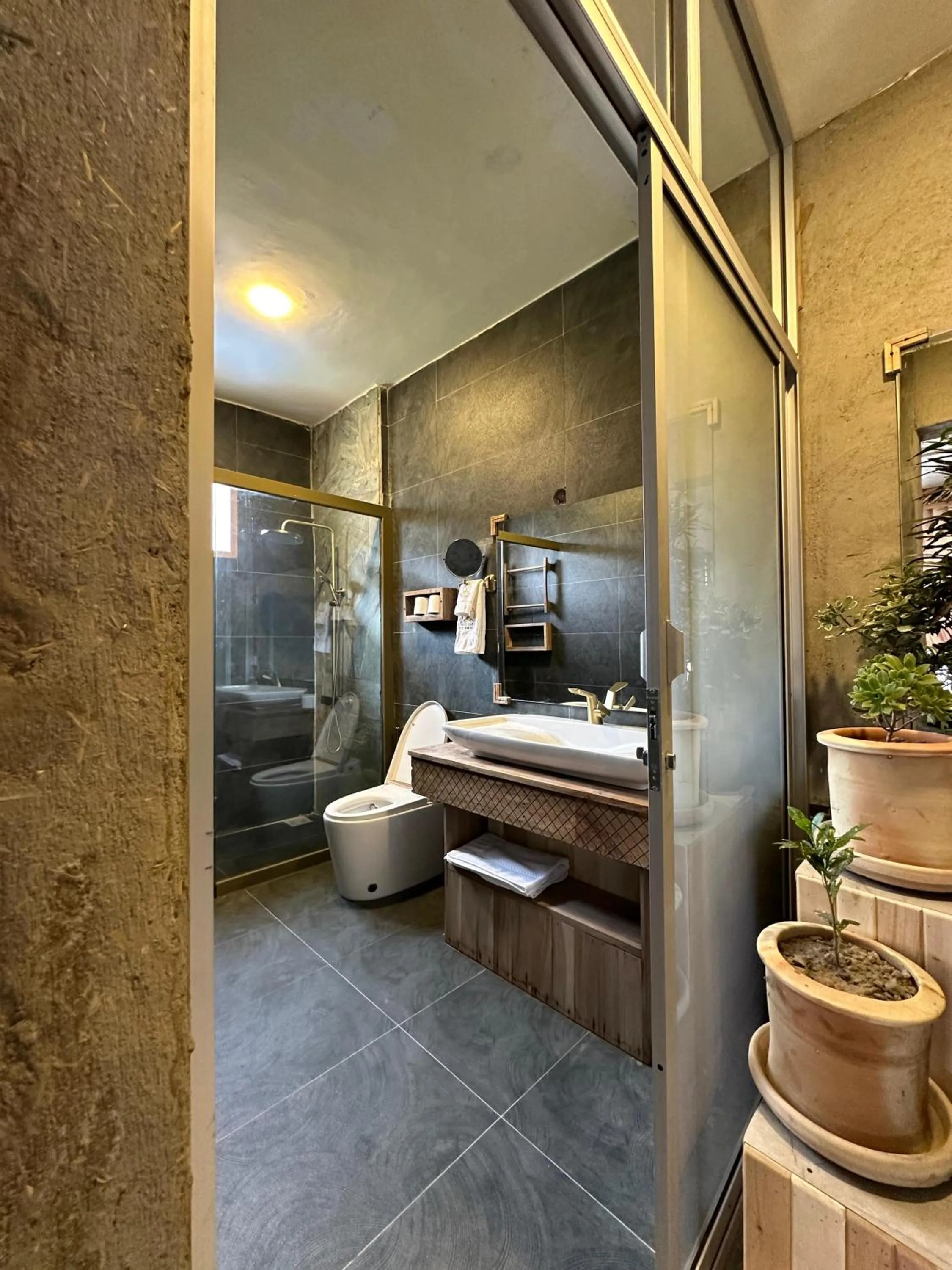 Bathroom in Dumani Nagar Hotel & Resort