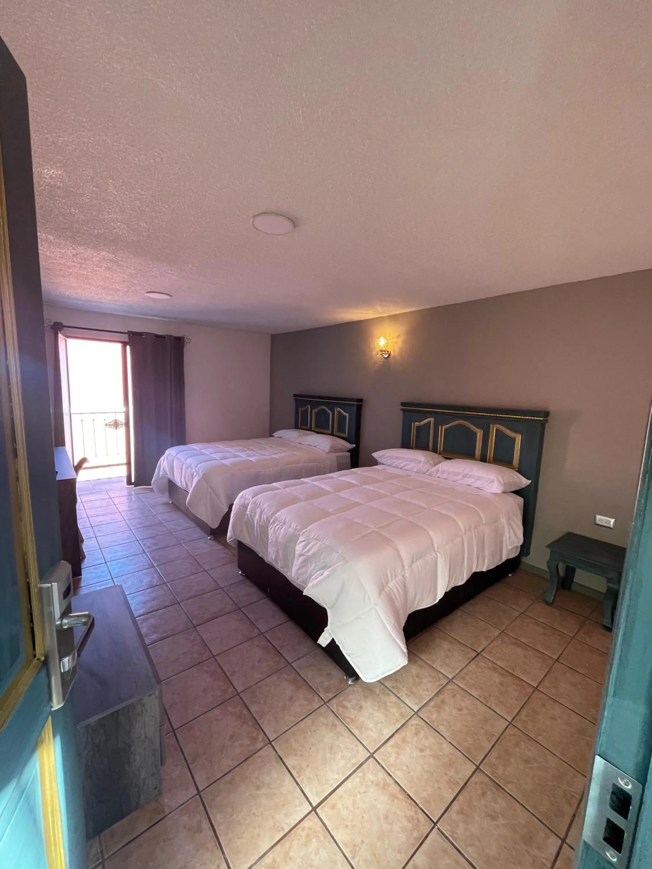 Bed in Hotel Casa Real Cholula