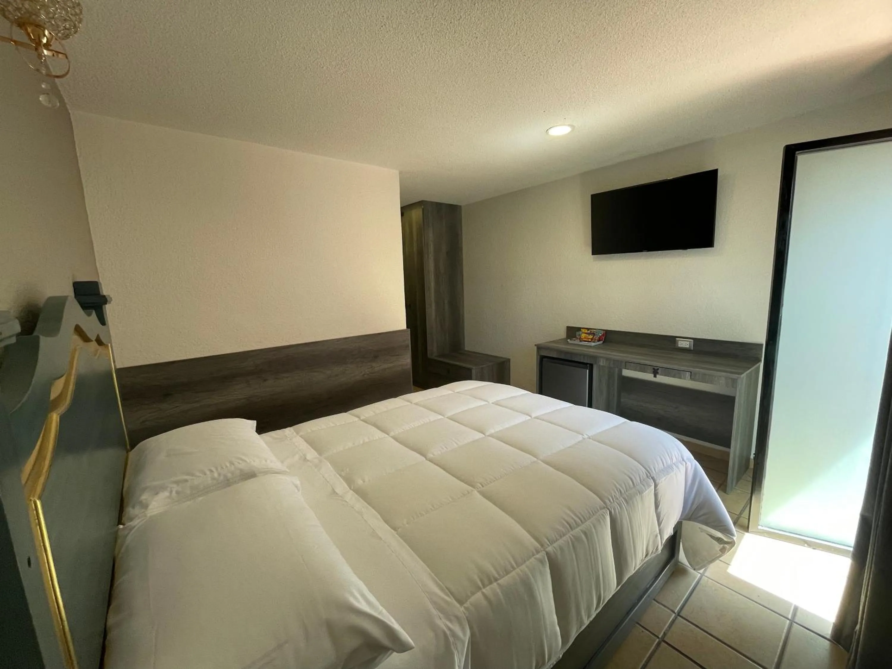 Bed in Hotel Casa Real Cholula