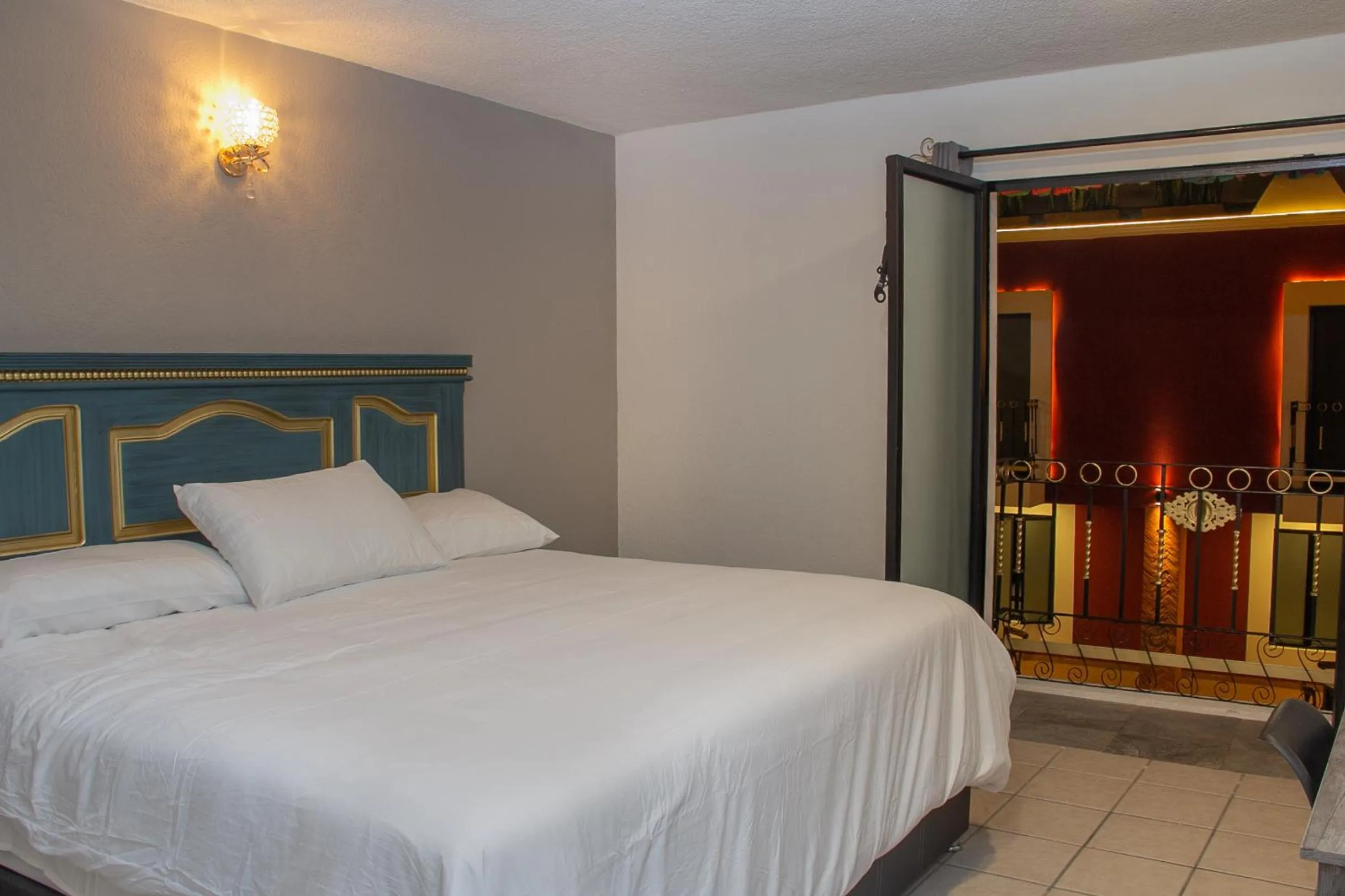 Bed in Hotel Casa Real Cholula