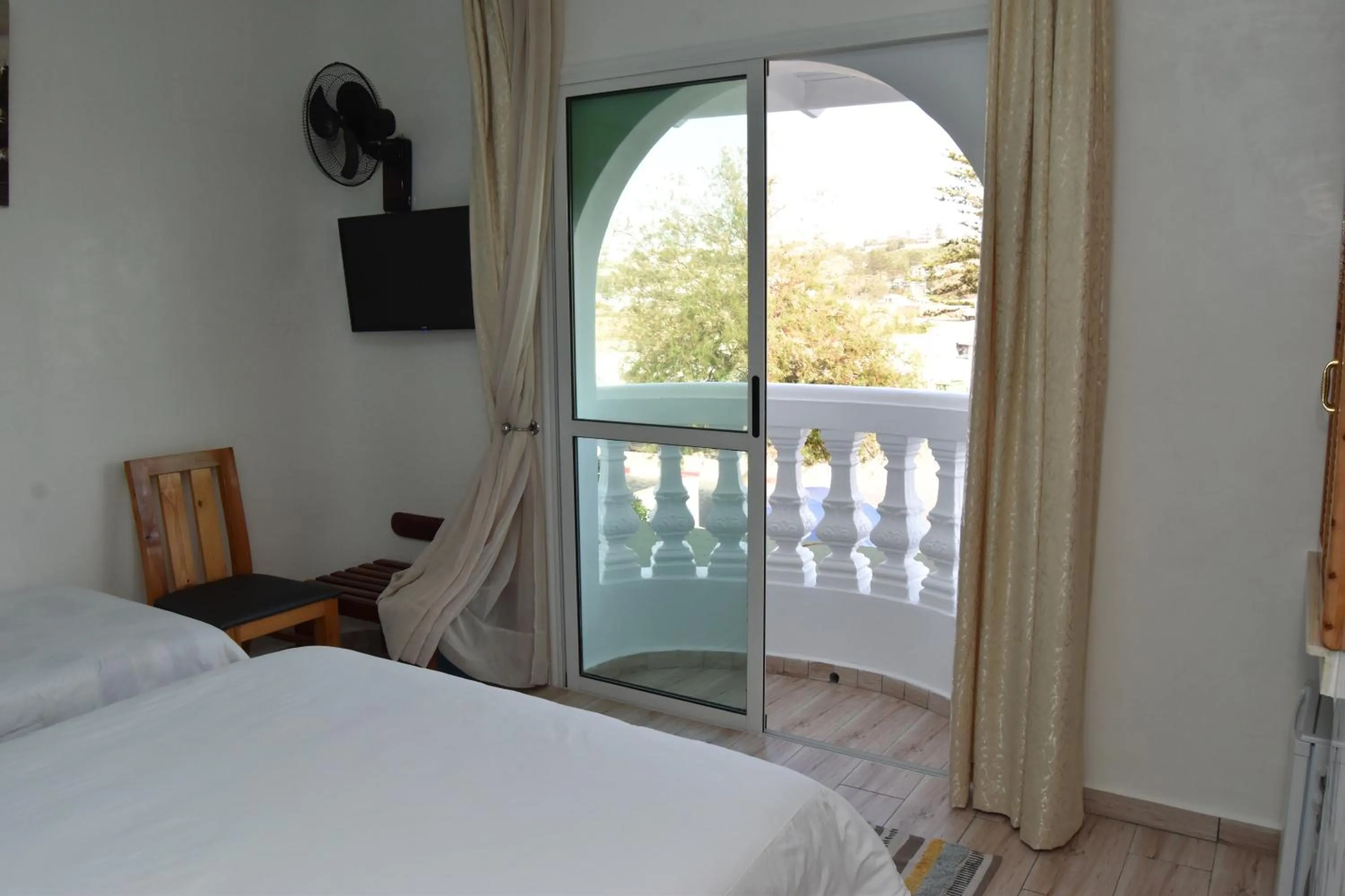 Triple Room with Lake View in Hotel L'Initiale