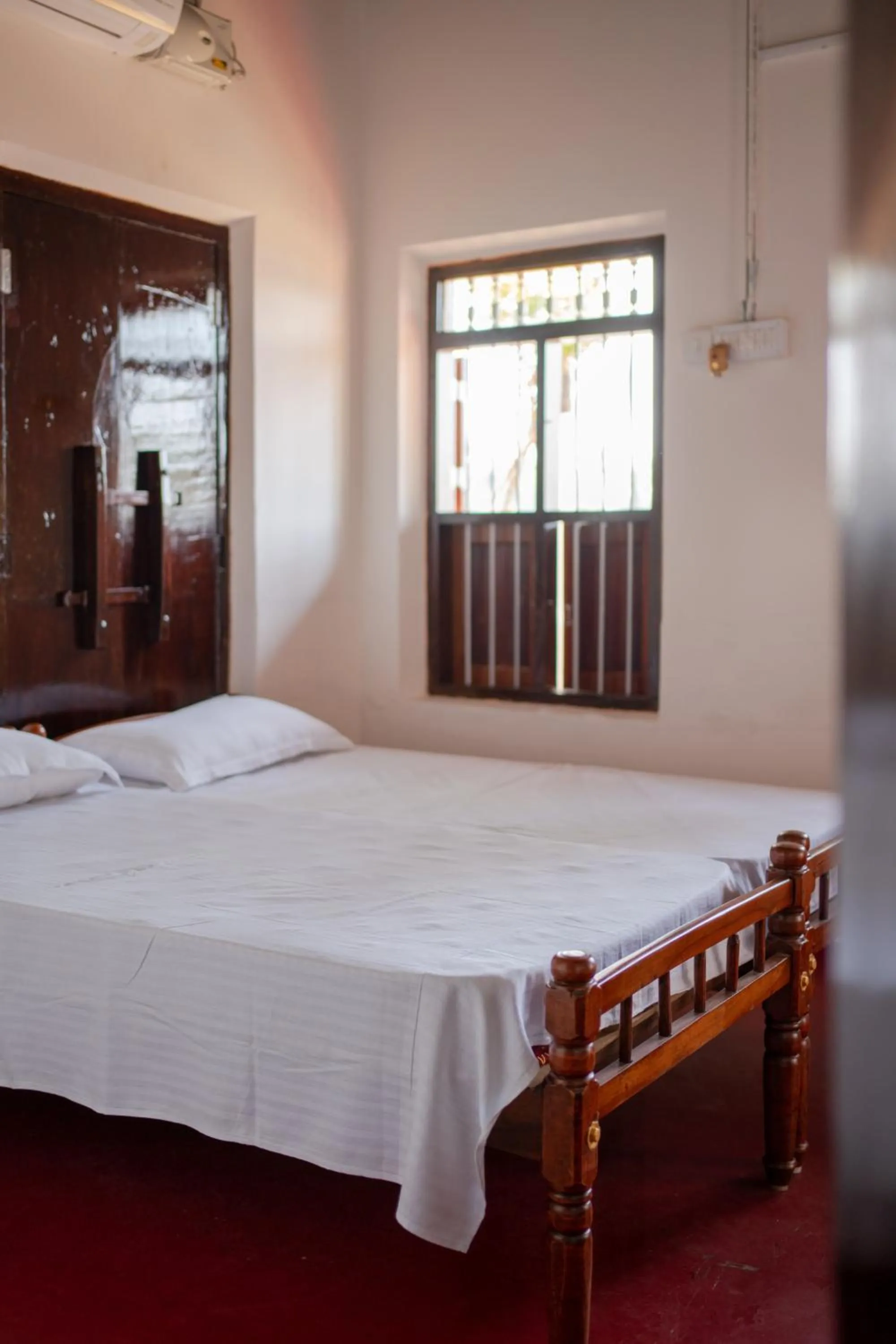 Bed in Kuttanad Kayak Club by Lexstays