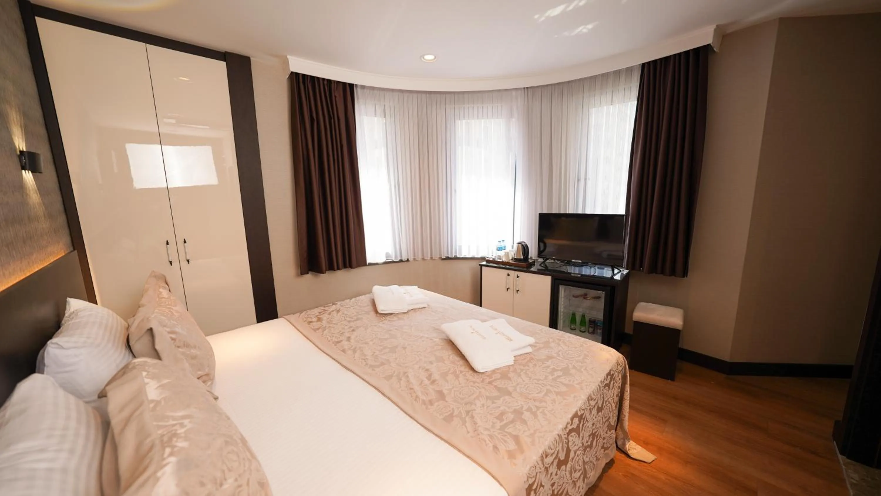 Bed in Bellezza Hotel