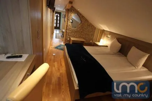 Bed in Hotel-Restaurant Kriva Ćuprija