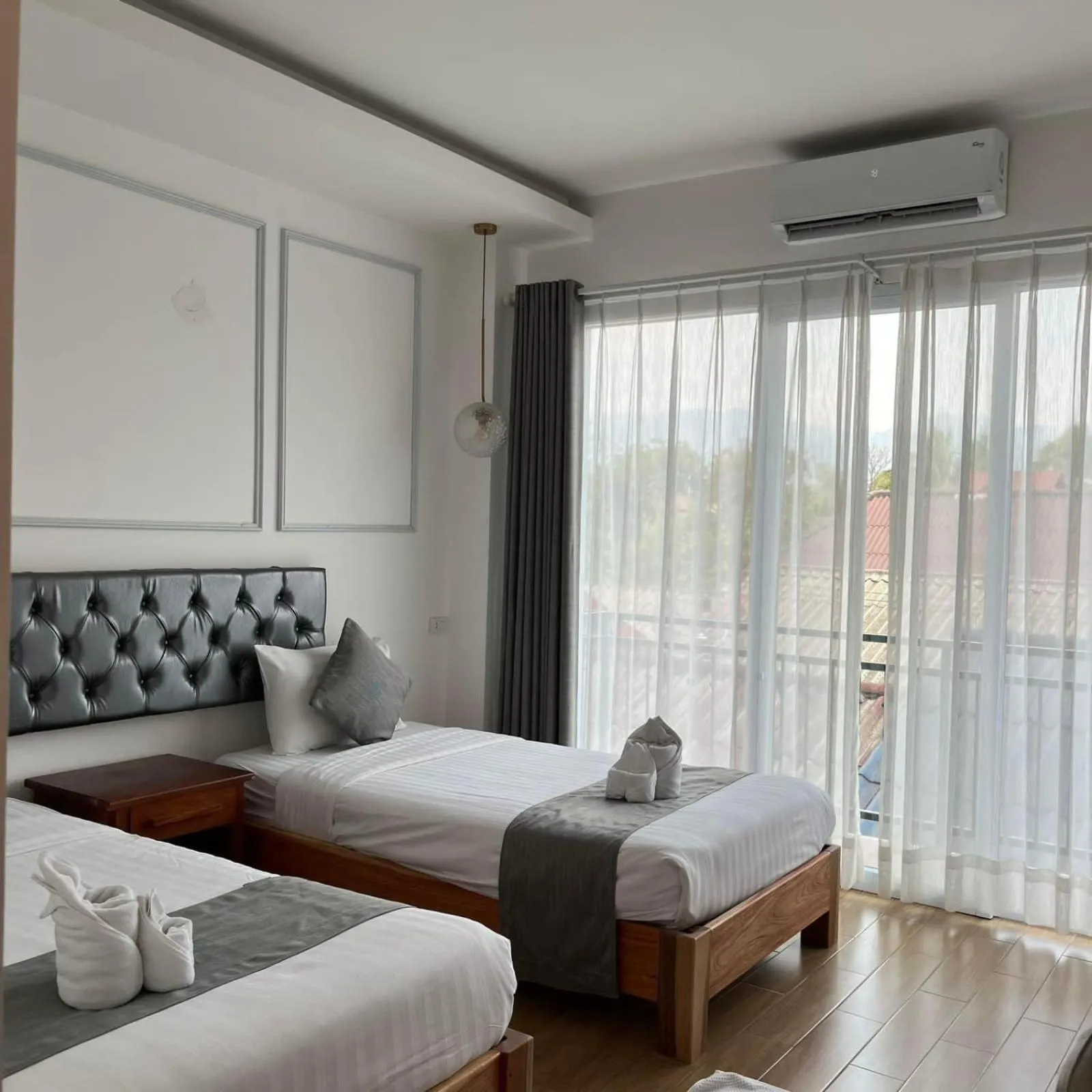 Bed in VangVieng Crystal Boutique Hotel