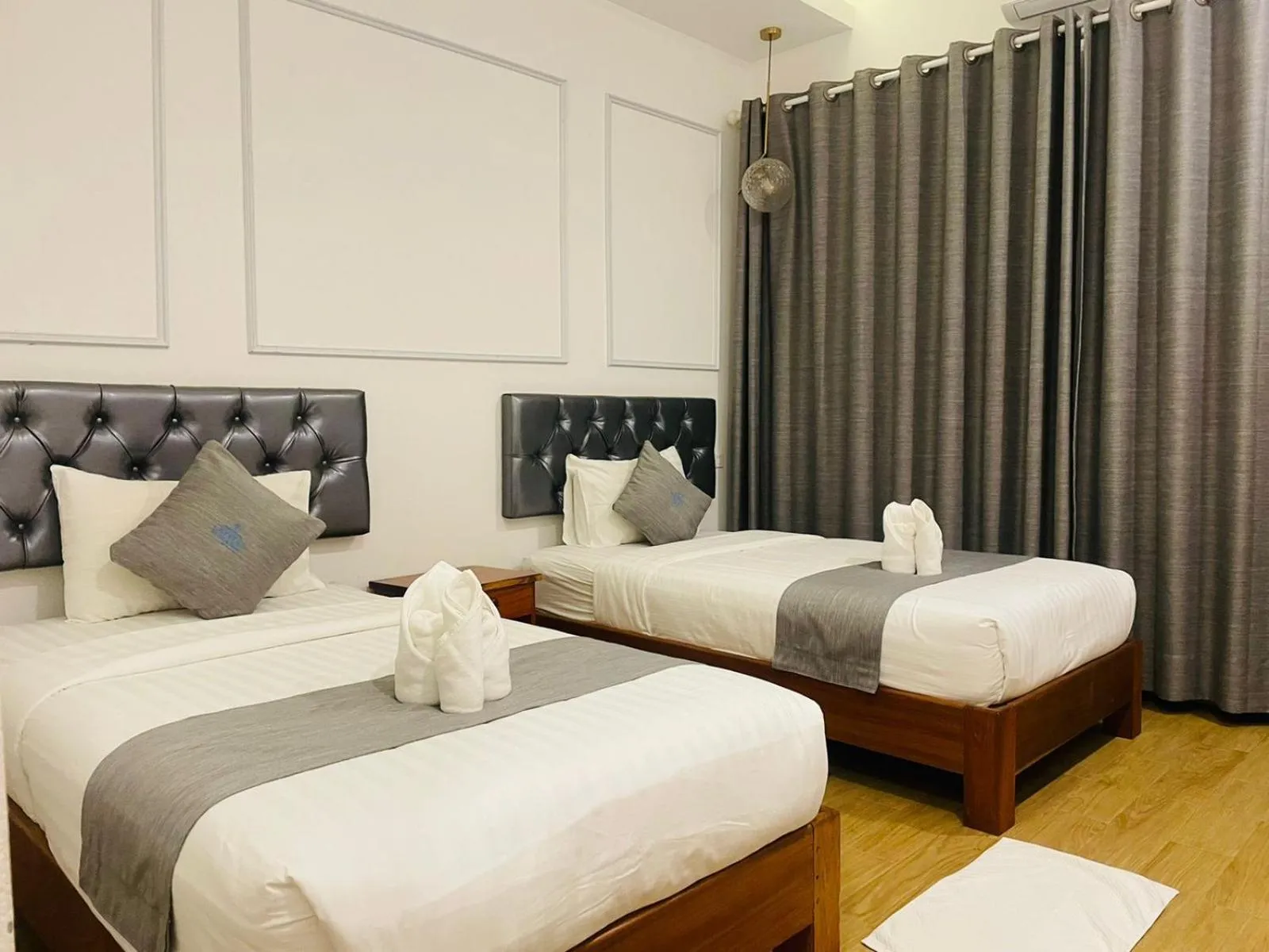 Bed in VangVieng Crystal Boutique Hotel