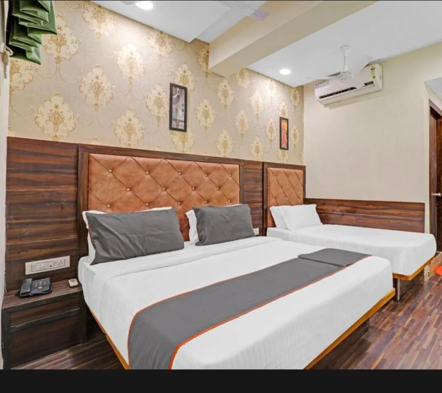 Bed in hotel stay inn Bopal
