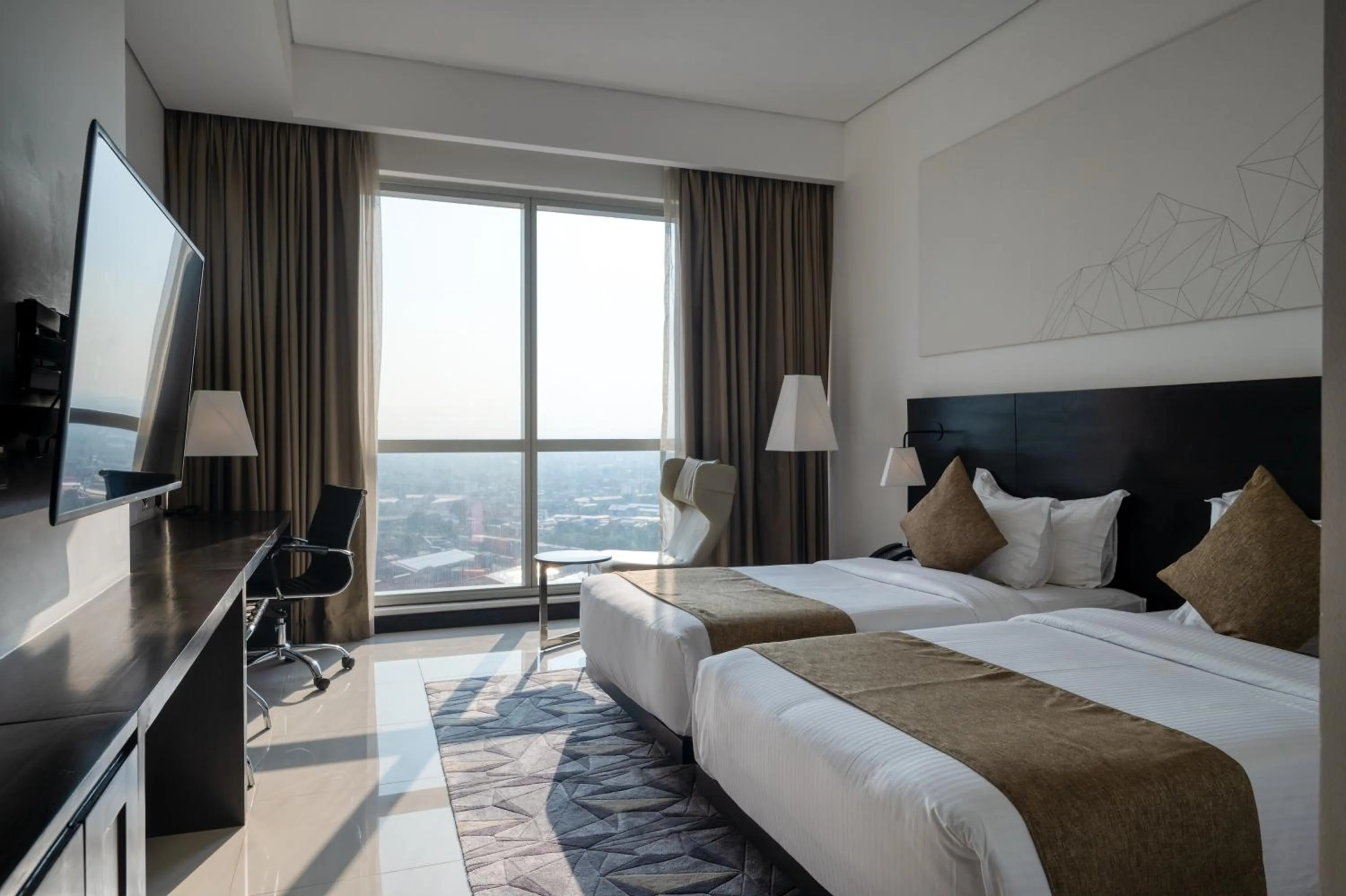 Bed in Orion City Hotel