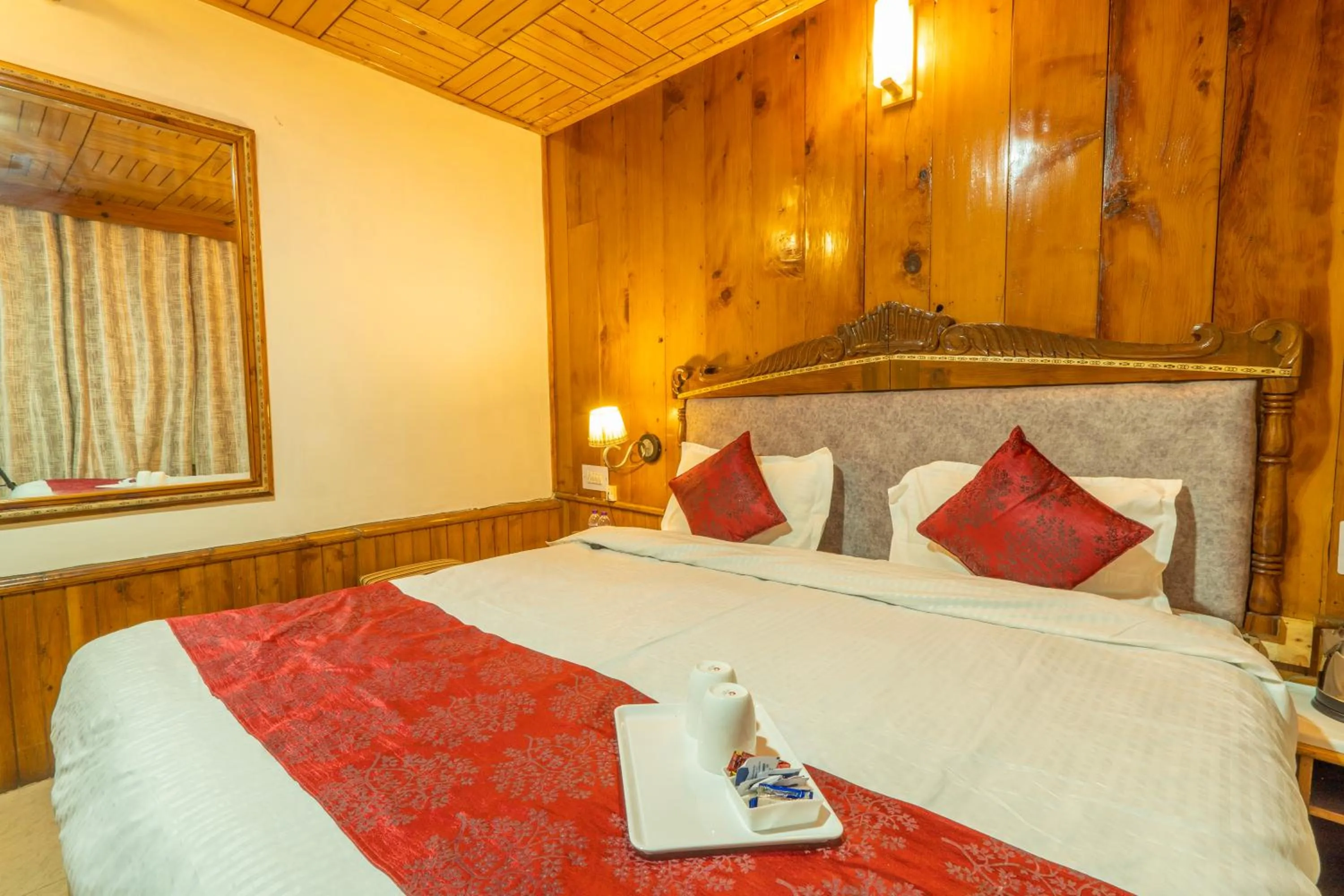 Bed in Holiday Home International -Vivaan Stays