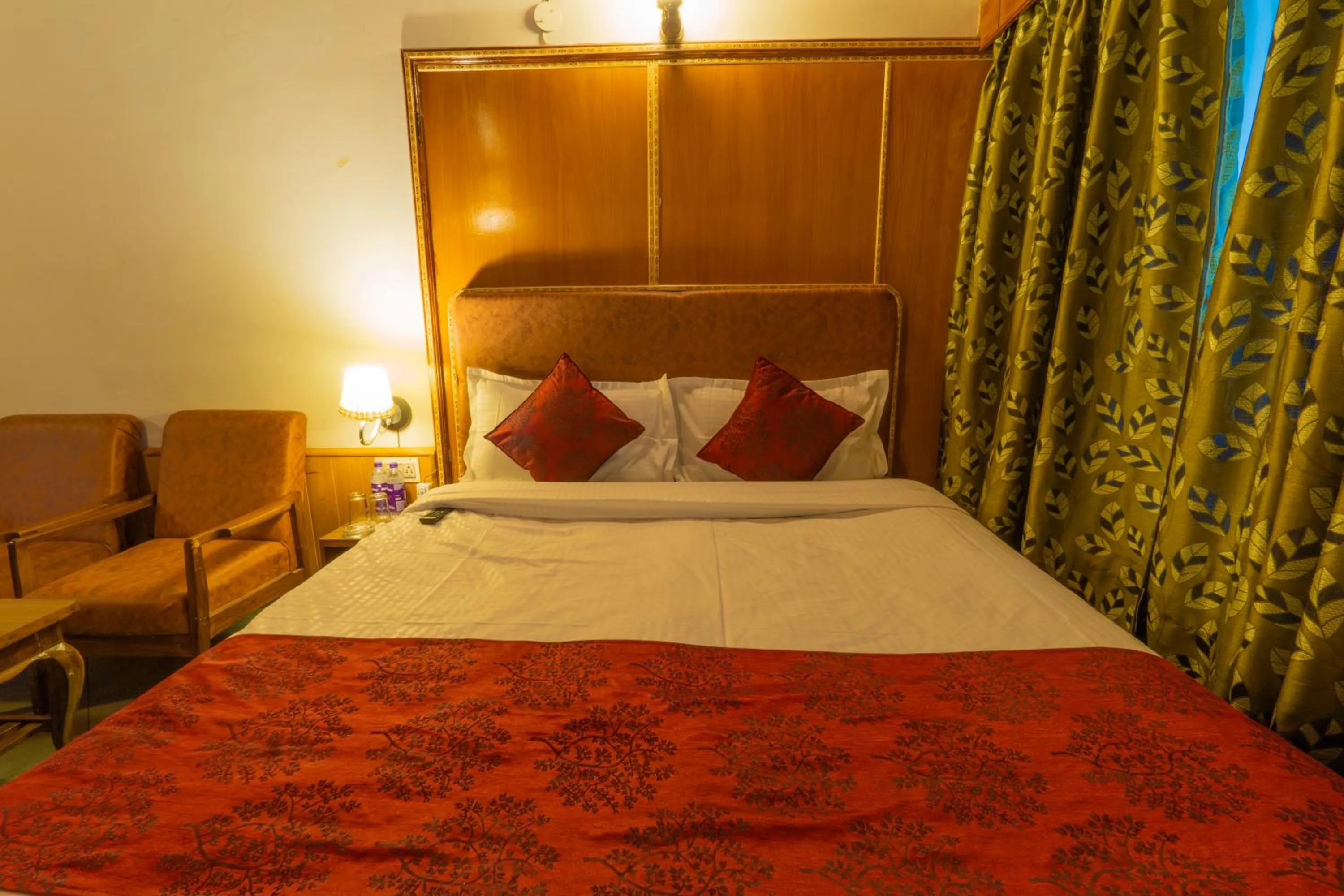 Bed in Holiday Home International -Vivaan Stays