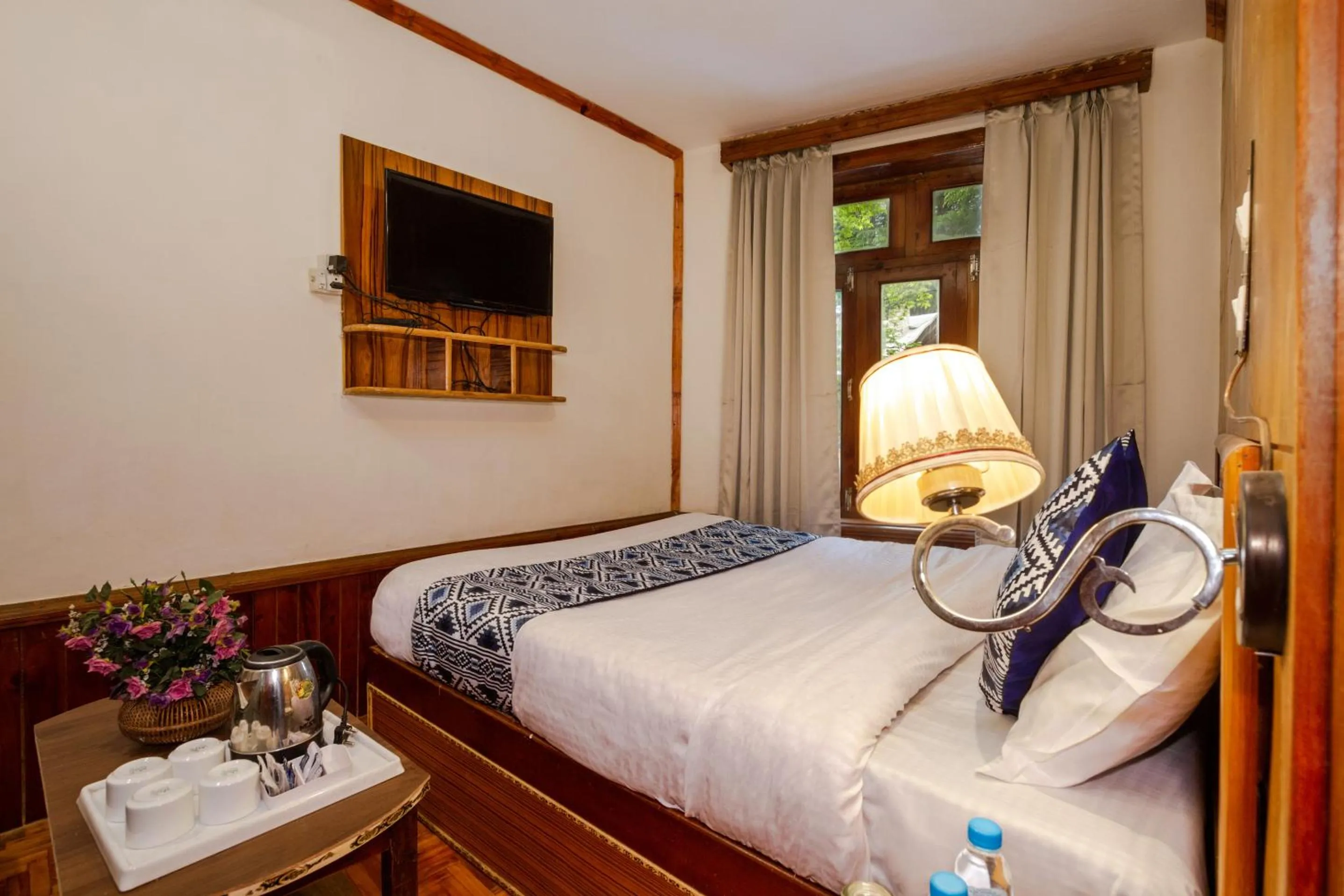 Bed in Holiday Home International -Vivaan Stays