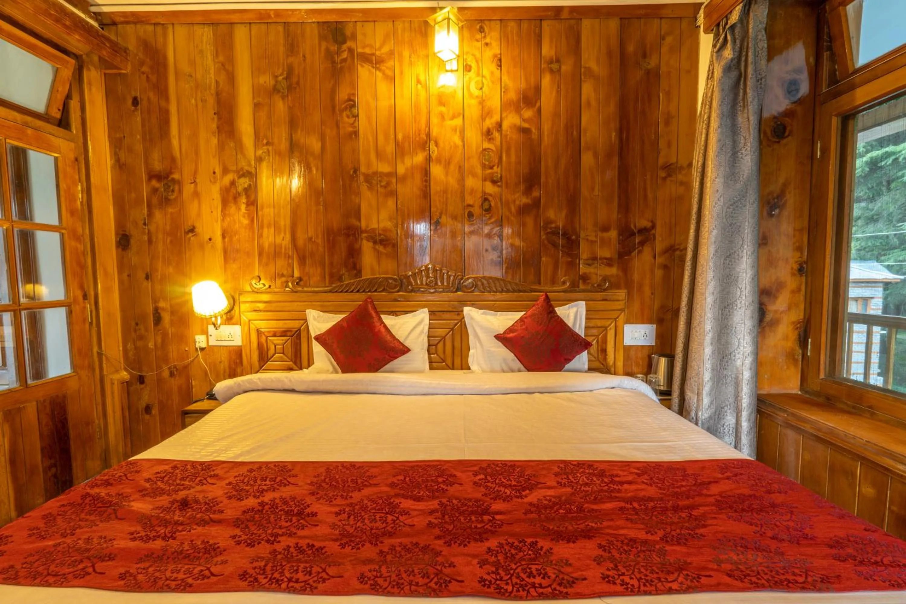 Bed in Holiday Home International -Vivaan Stays