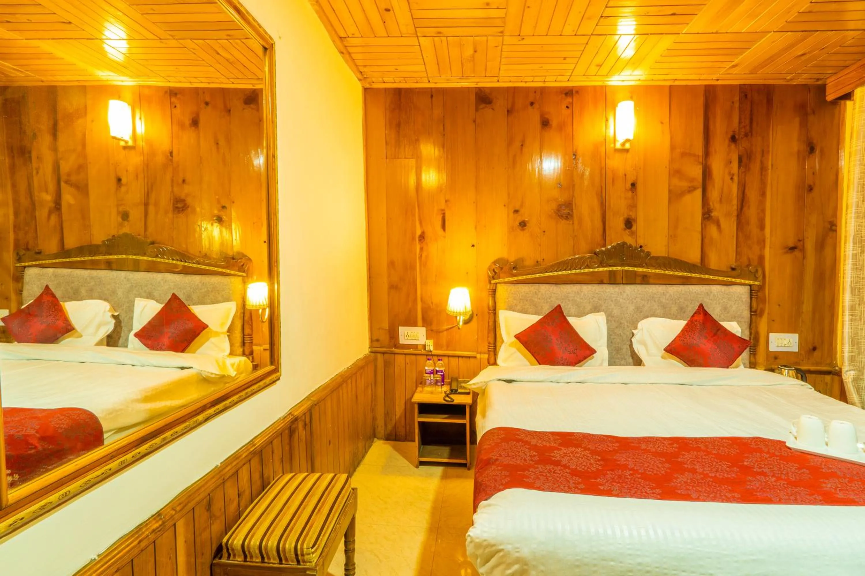 Bed in Holiday Home International -Vivaan Stays