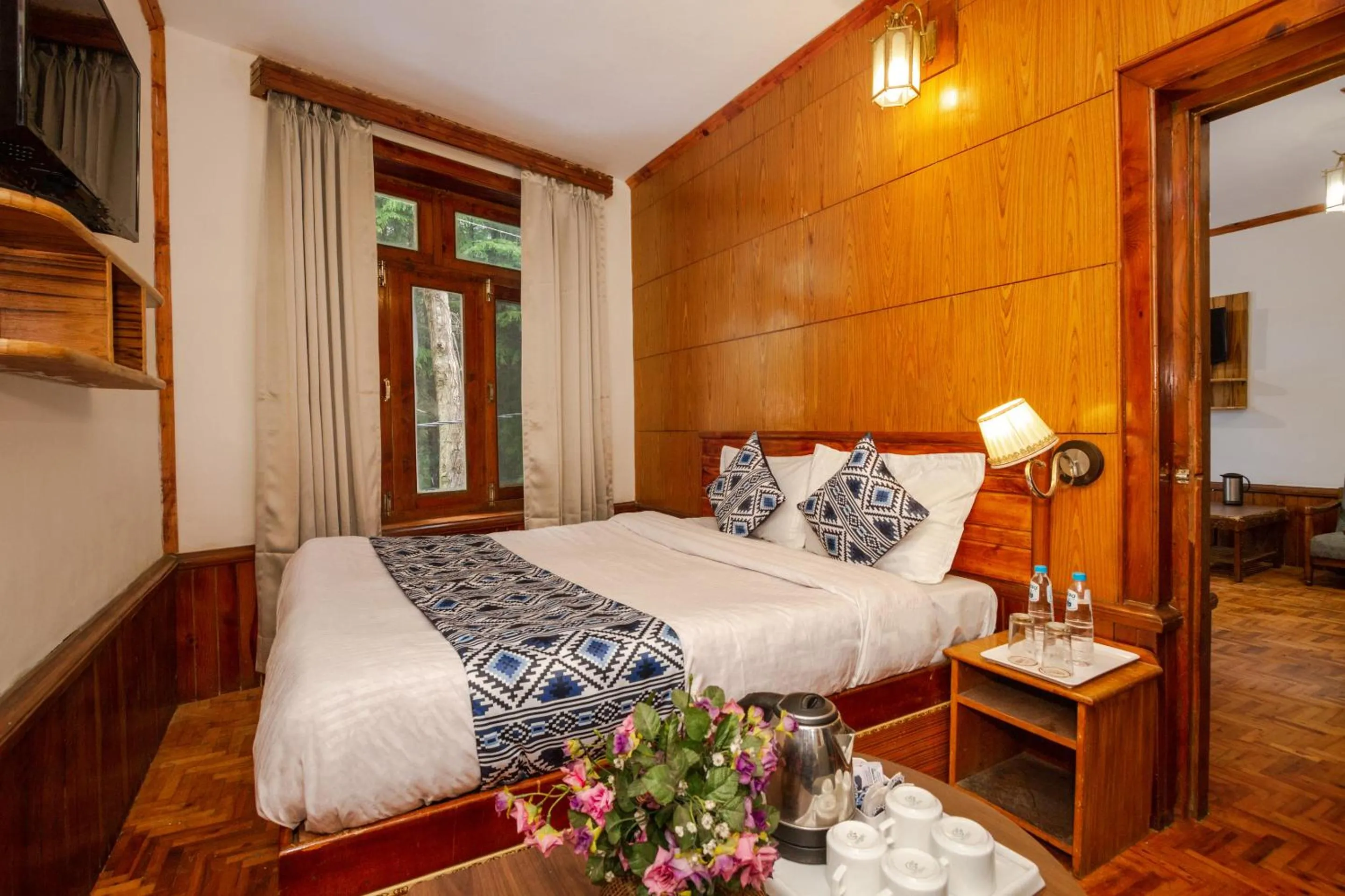 Bed in Holiday Home International -Vivaan Stays