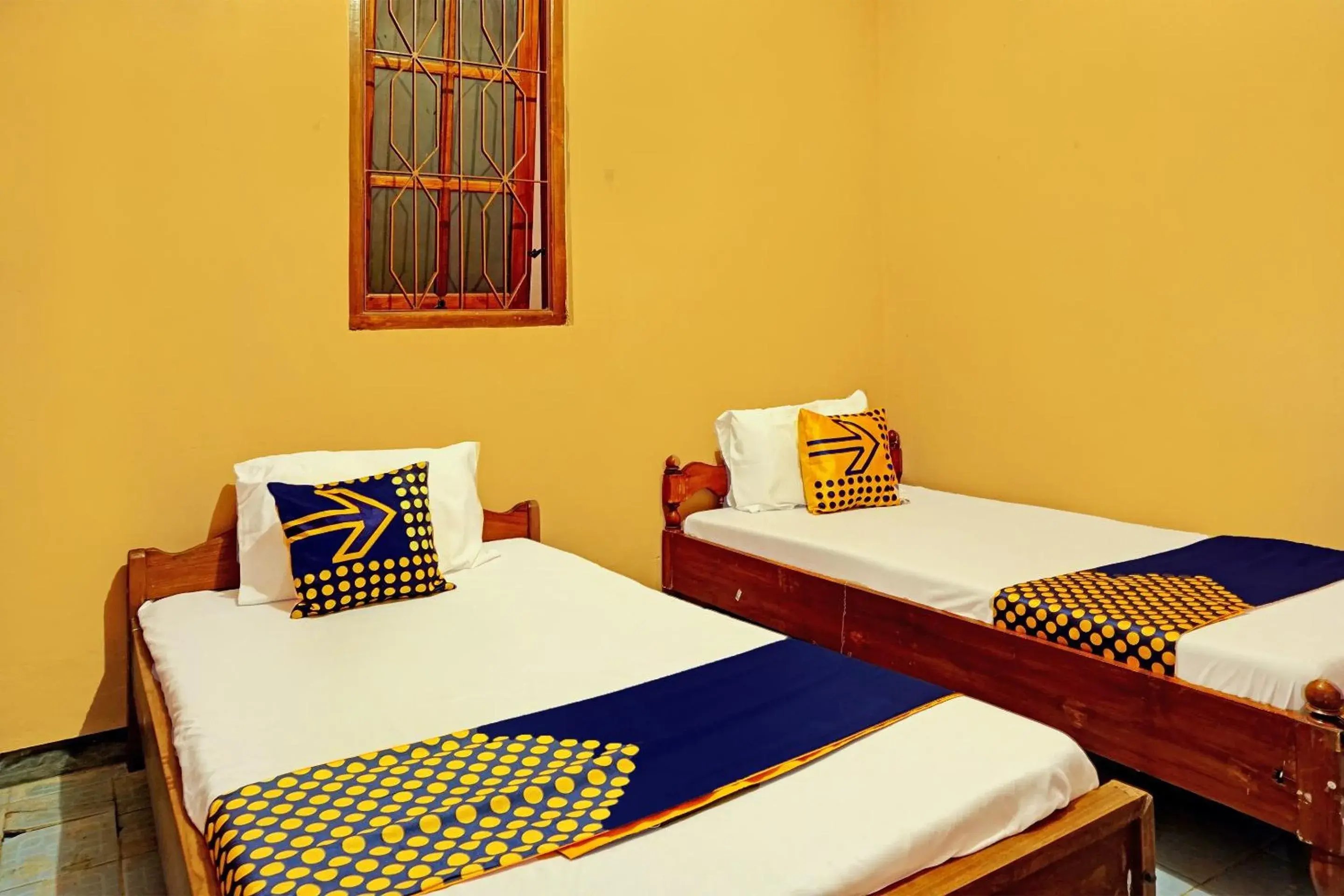 Economy Twin Room in Hotel O Homestay Simpang Panji Suroso Syariah Economy Twin Room in Hotel O Homestay Simpang Panji Suroso Syariah