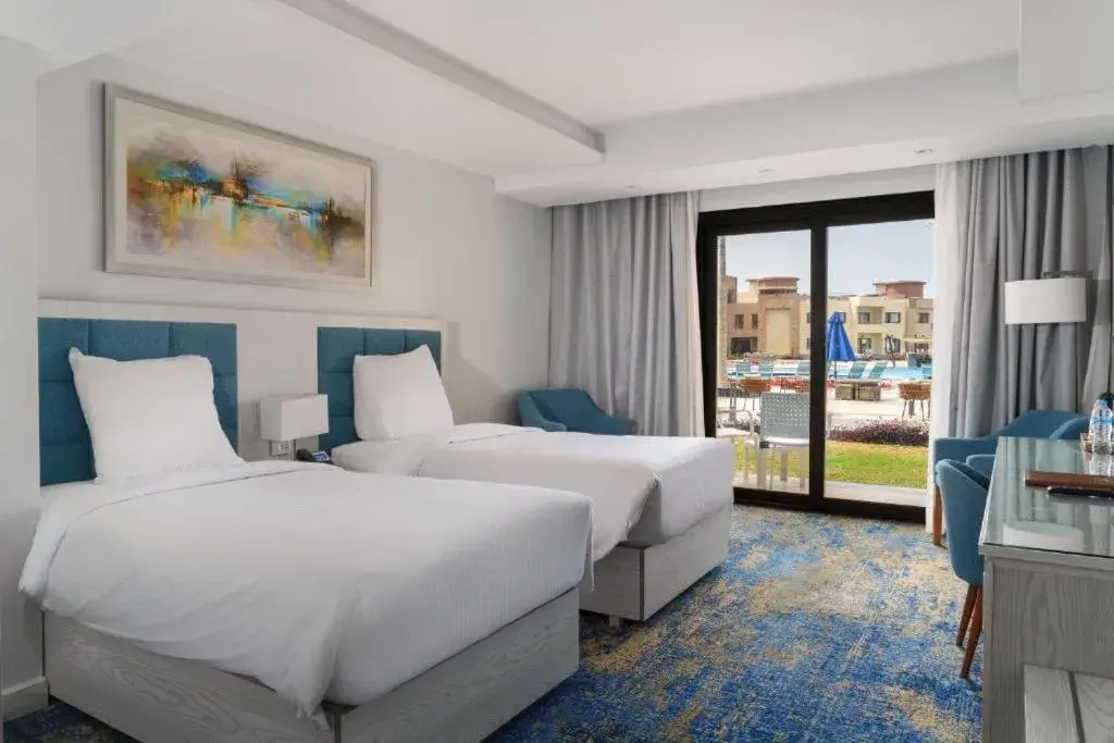 Superior Double or Twin Room with Garden View in Helnan Hotel - Port Fouad Superior Double or Twin Room with Garden View in Helnan Hotel - Port Fouad