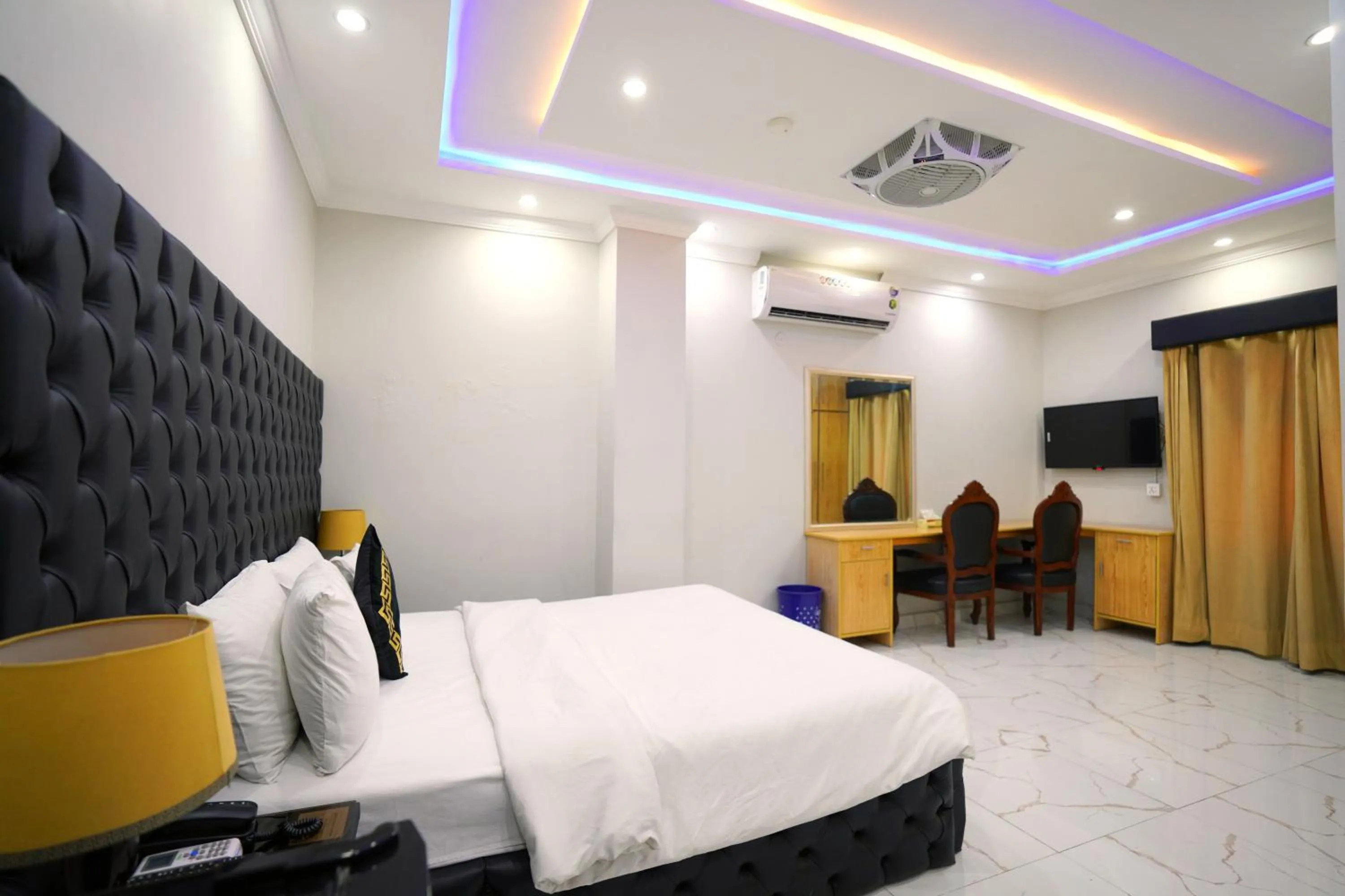 Bed in Hotel Orange One