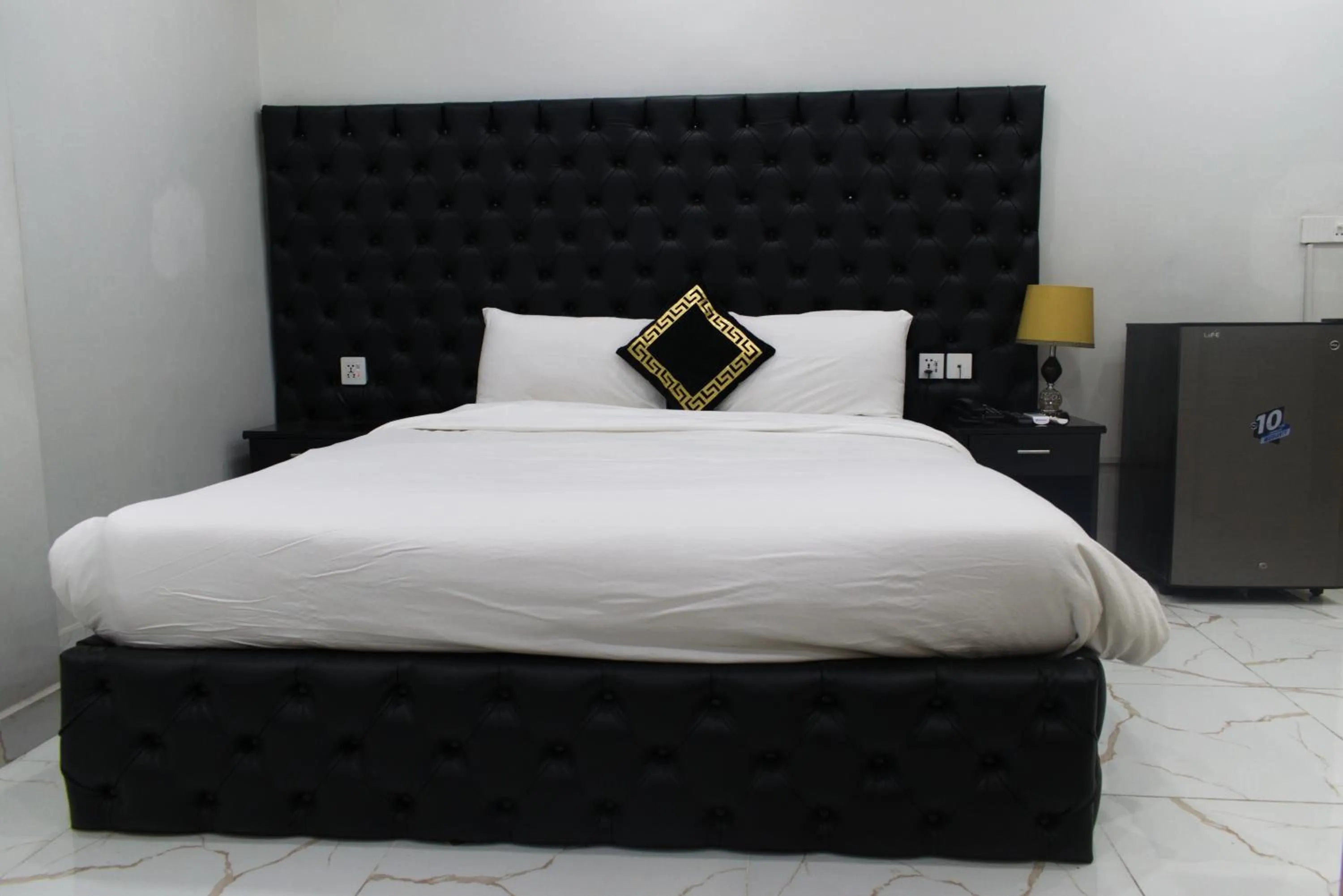 Bed in Hotel Orange One