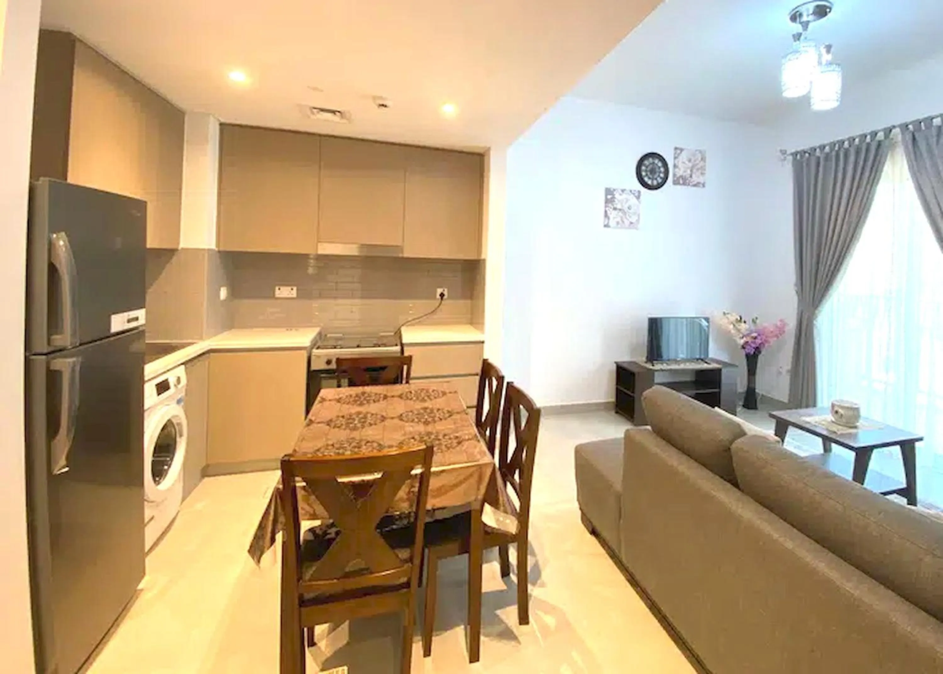 TV and multimedia, Kitchen/Kitchenette in Super OYO 928 Home 436 Binghatti Mirage - 1Br, Jvc