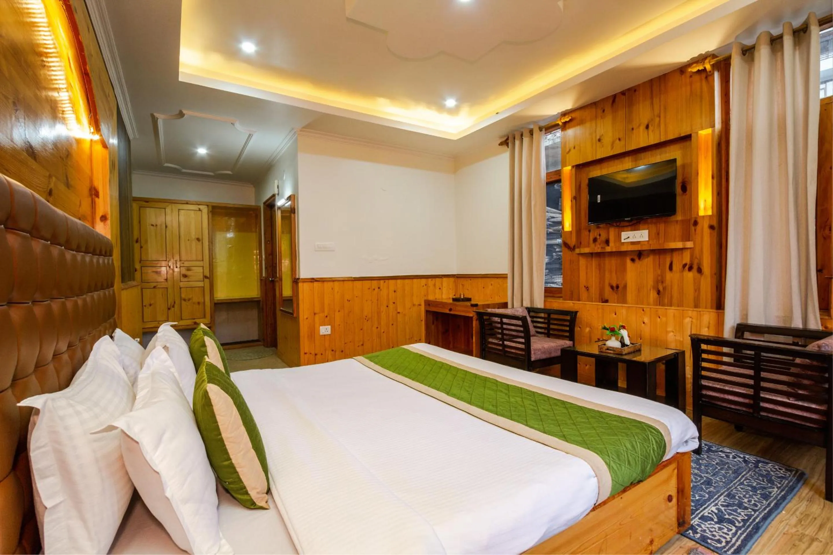 Bed in Tripli Hotels Conifer Wood Cottage
