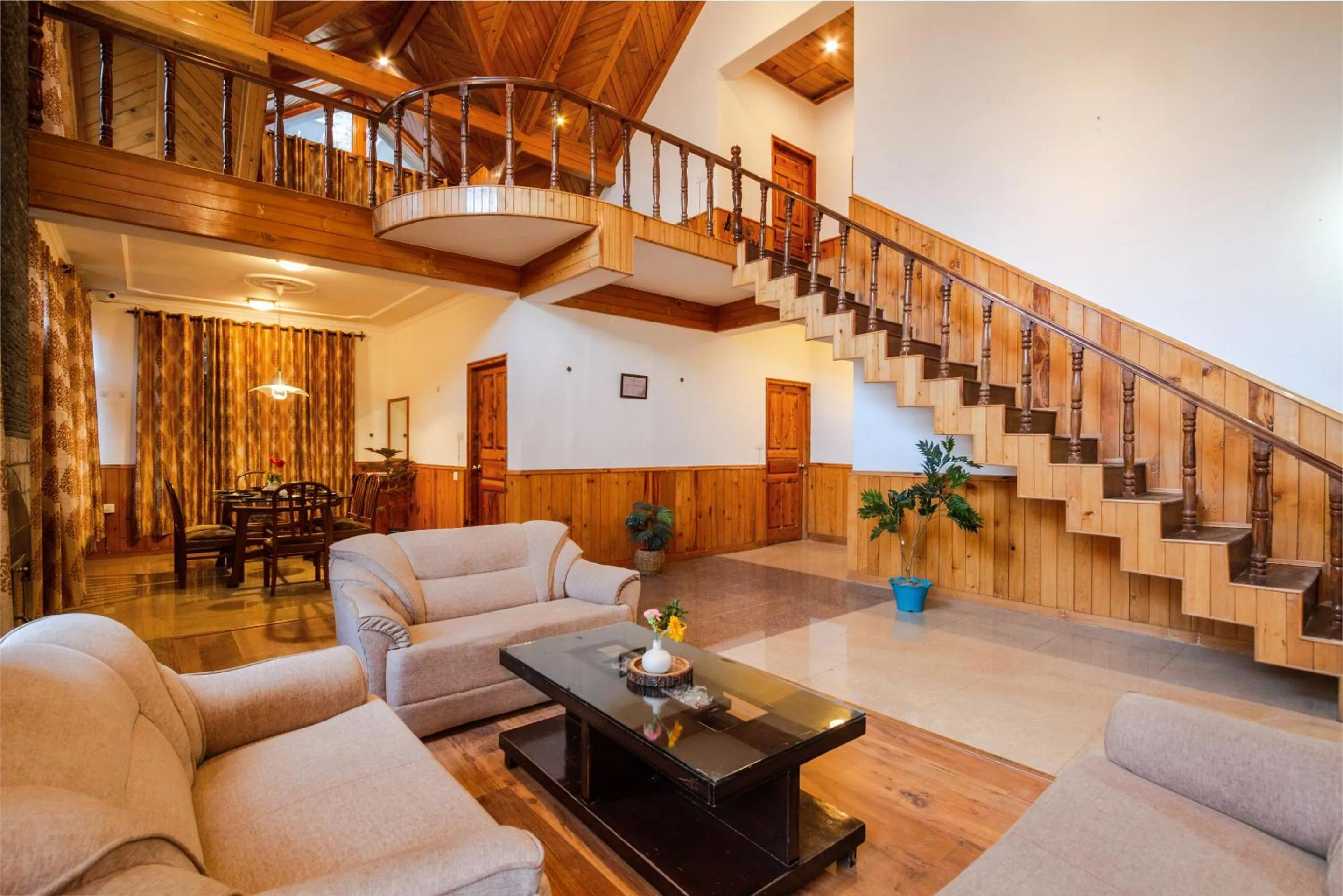 Communal lounge/ TV room in Tripli Hotels Conifer Wood Cottage