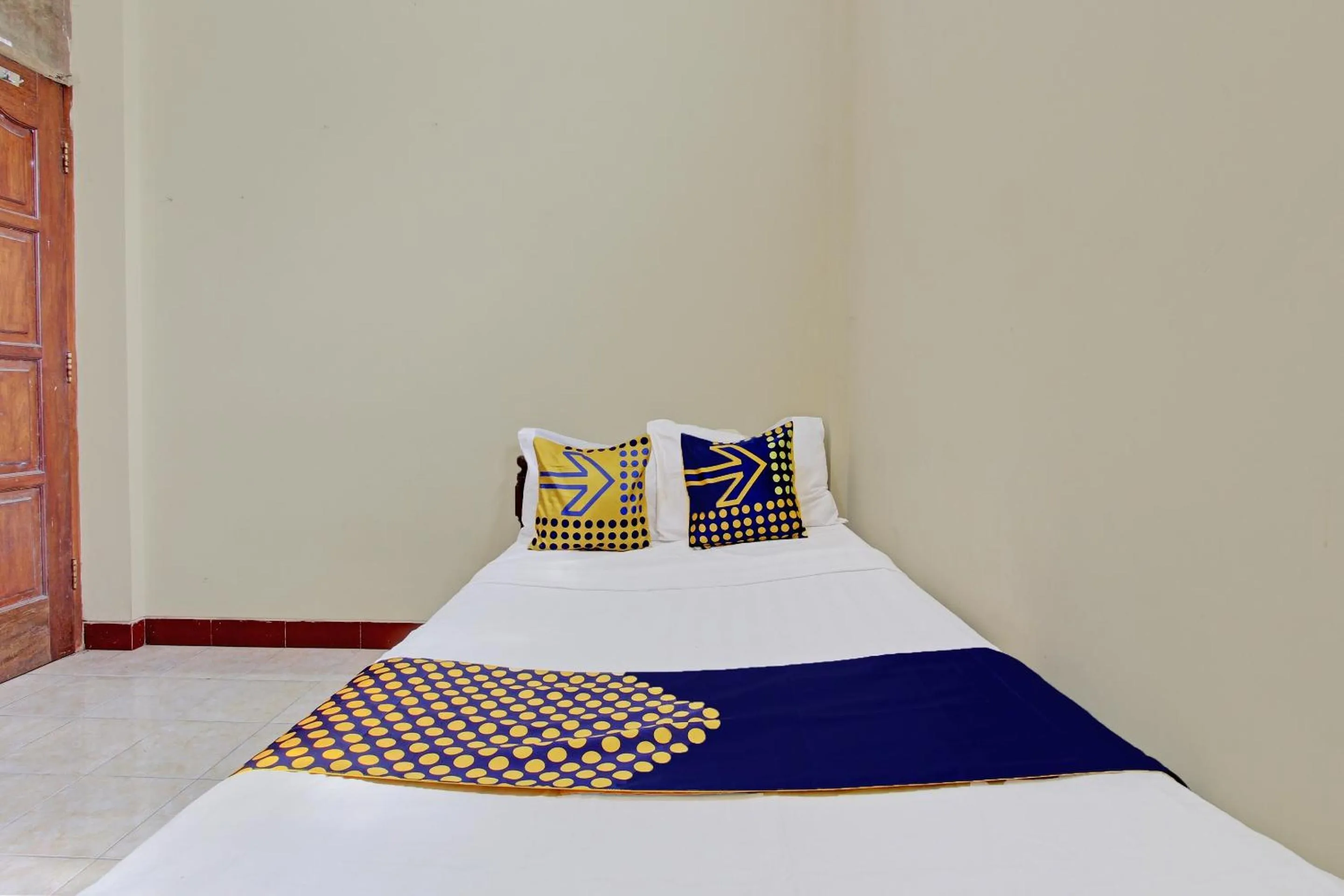 Bedroom in Hotel O Puri Kasih Guest House Syariah